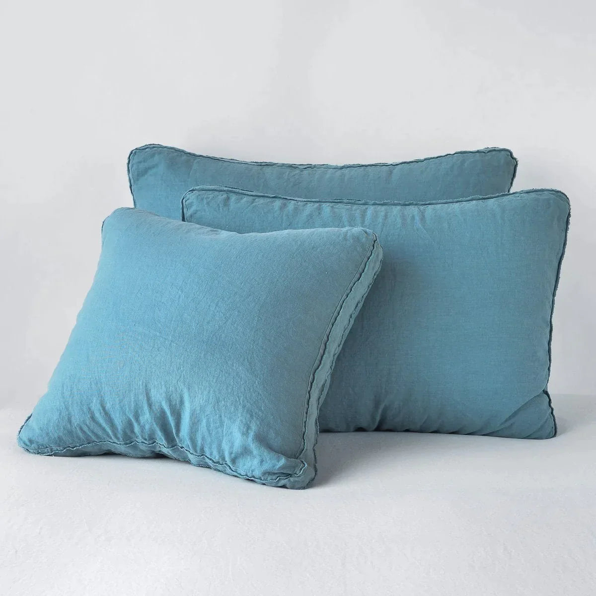 : Austin shams in cenote colorway shown leaning upright on white background.