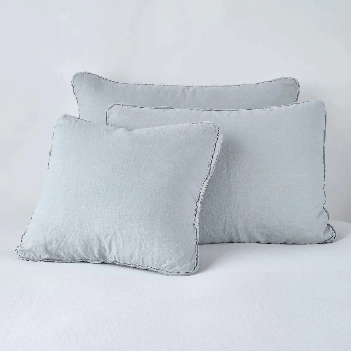 Mineral: Midweight linen shams in mineral colorway shown leaning upright on white background.