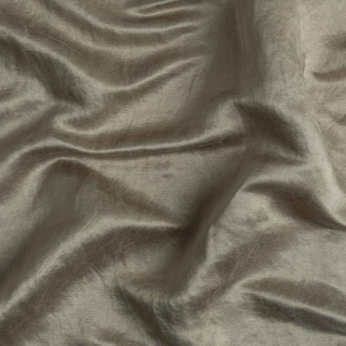 Moonlight: A close up of charmeuse fabric in moonlight, a saturated, cool, mid-dark grey tone.