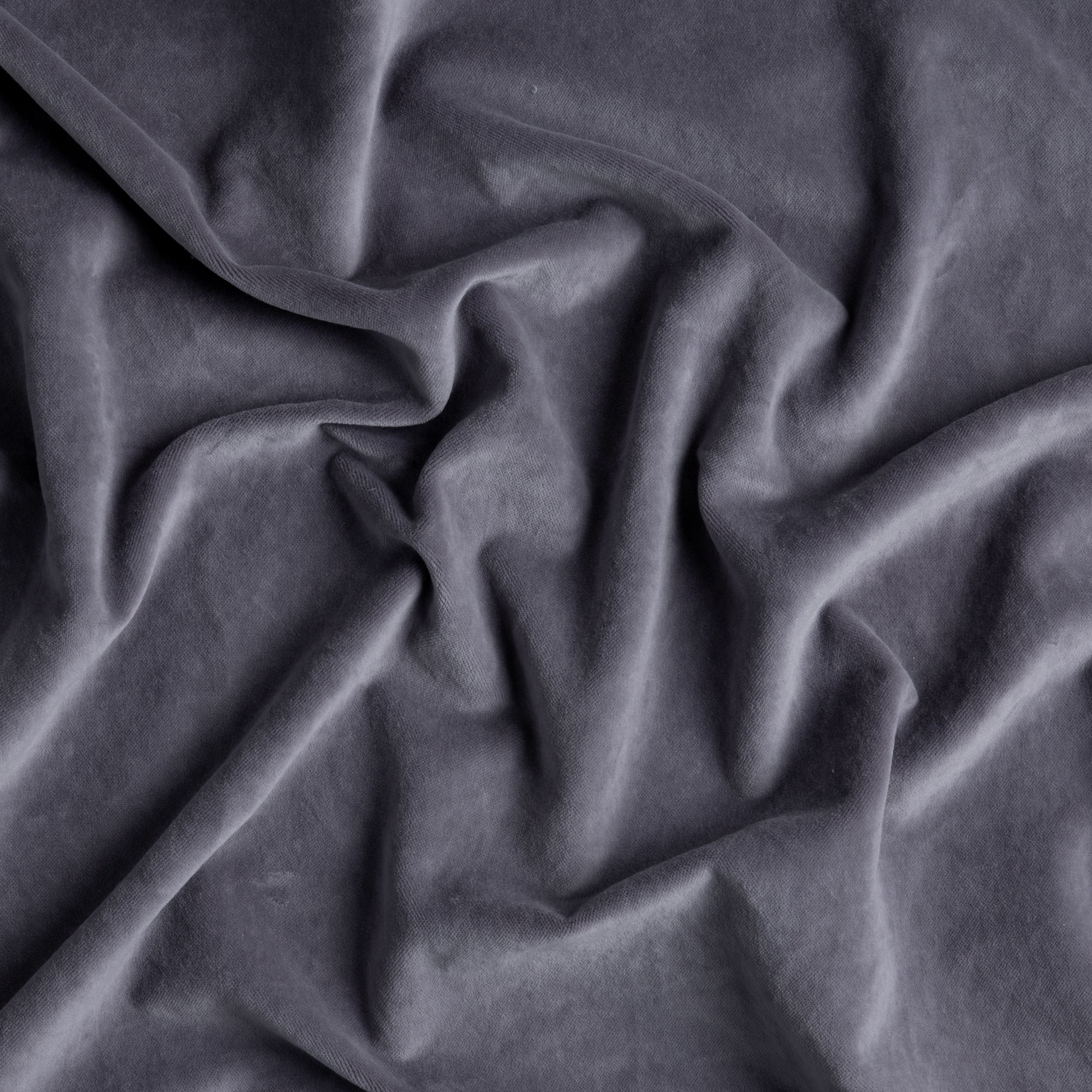 A close up of cotton velvet rumpled and shown in French Lavender, a neutral lavender tone.