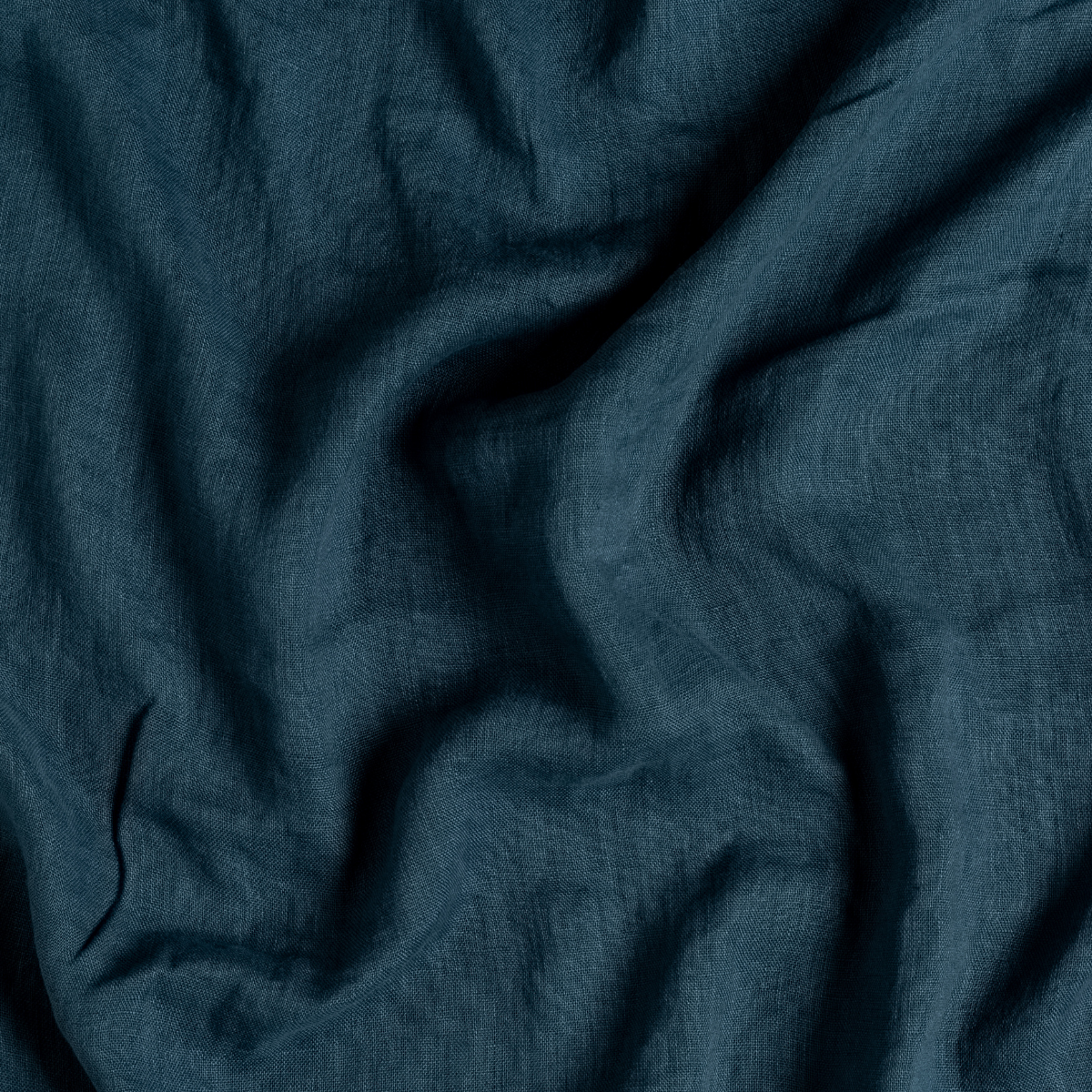 Midnight: A close up of linen whisper fabric in midnight, a rich indigo tone.