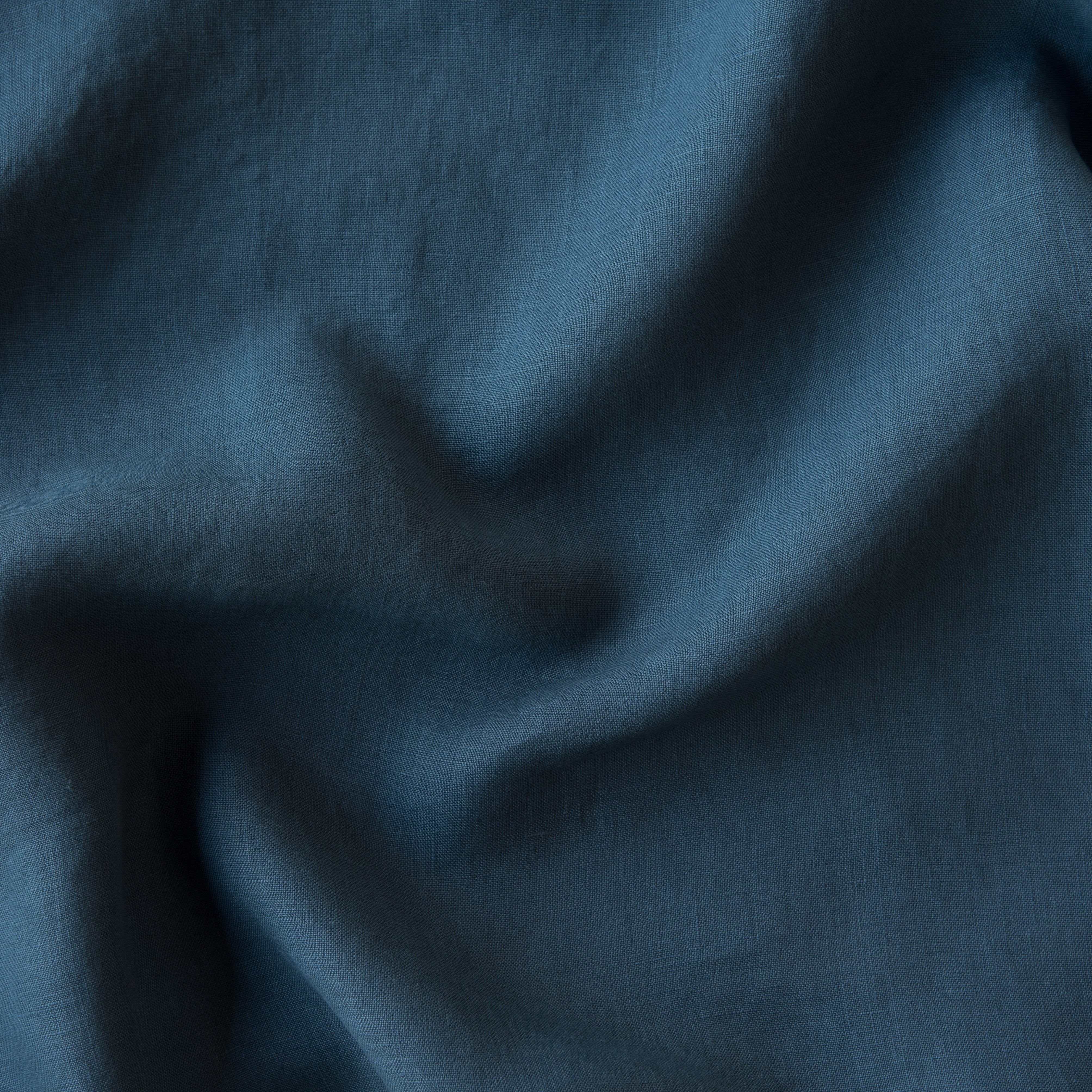 Midnight: A close up of linen in midnight, a rich indigo tone.