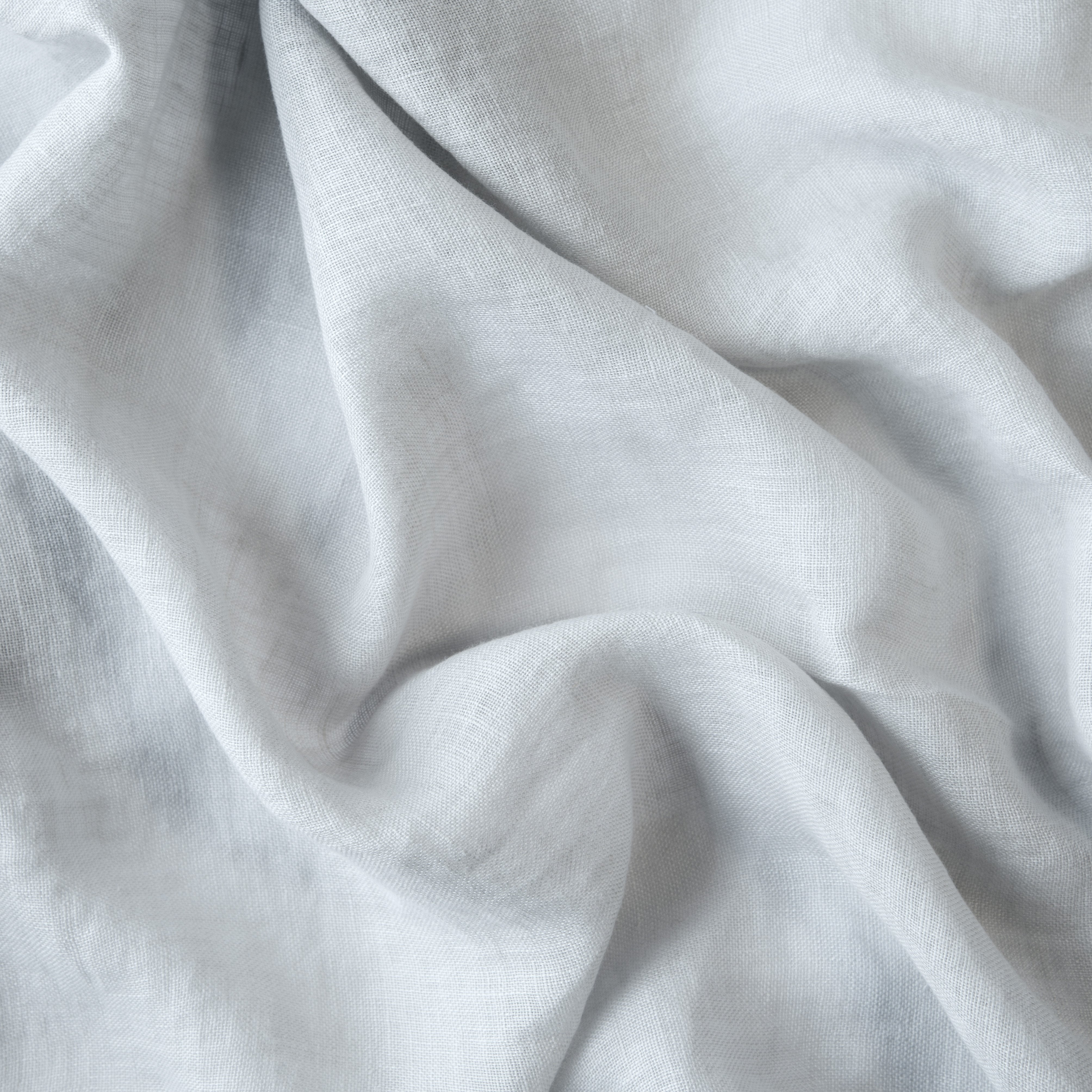 Cloud: A close up of linen whisper, our lightweight linen gauze, in cloud, a soft, subtle sky blue-grey.