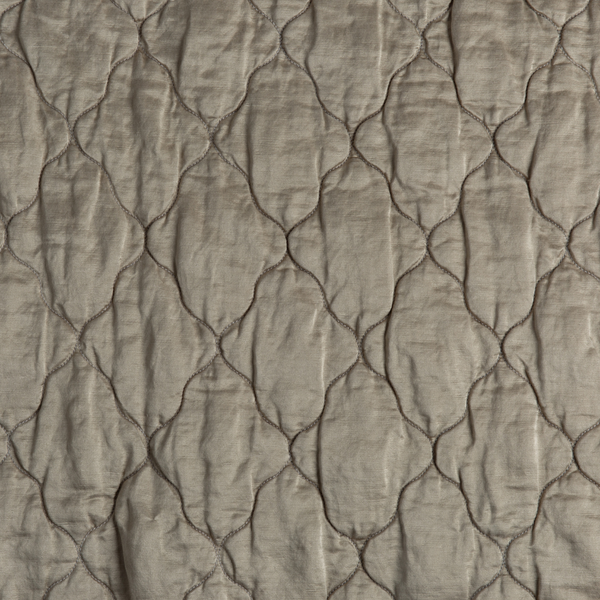 Moonlight: A close up of quilted charmeuse fabric in moonlight, a saturated, cool, mid-dark grey tone.