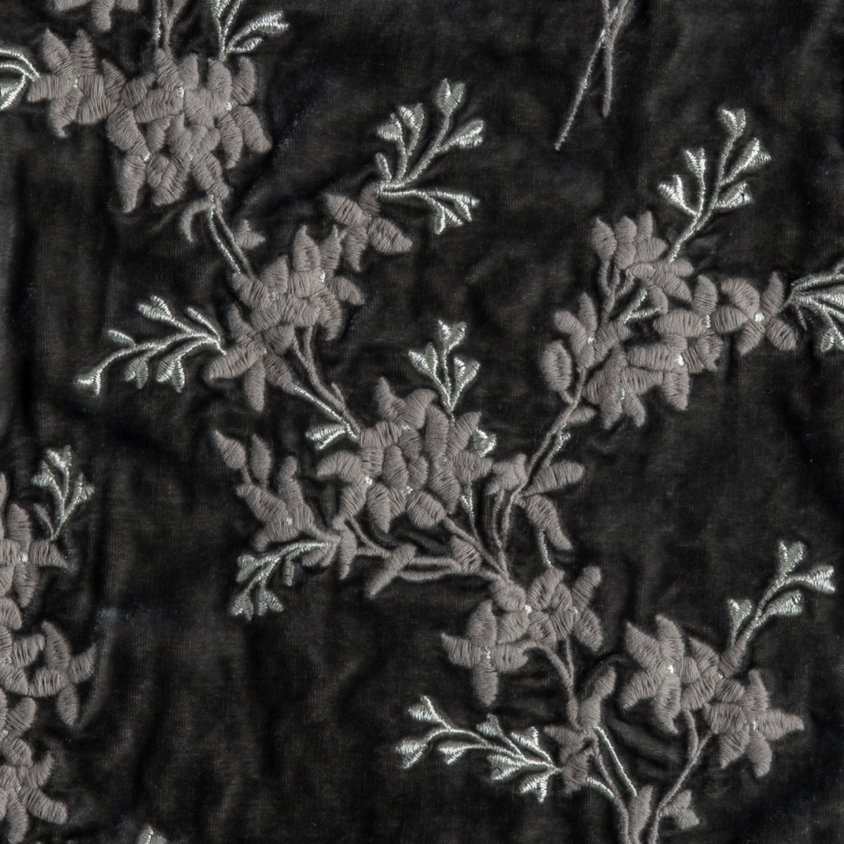 Fog: A close up of embroidered silk velvet fabric in fog, a neutral-warm, soft mid-tone grey.