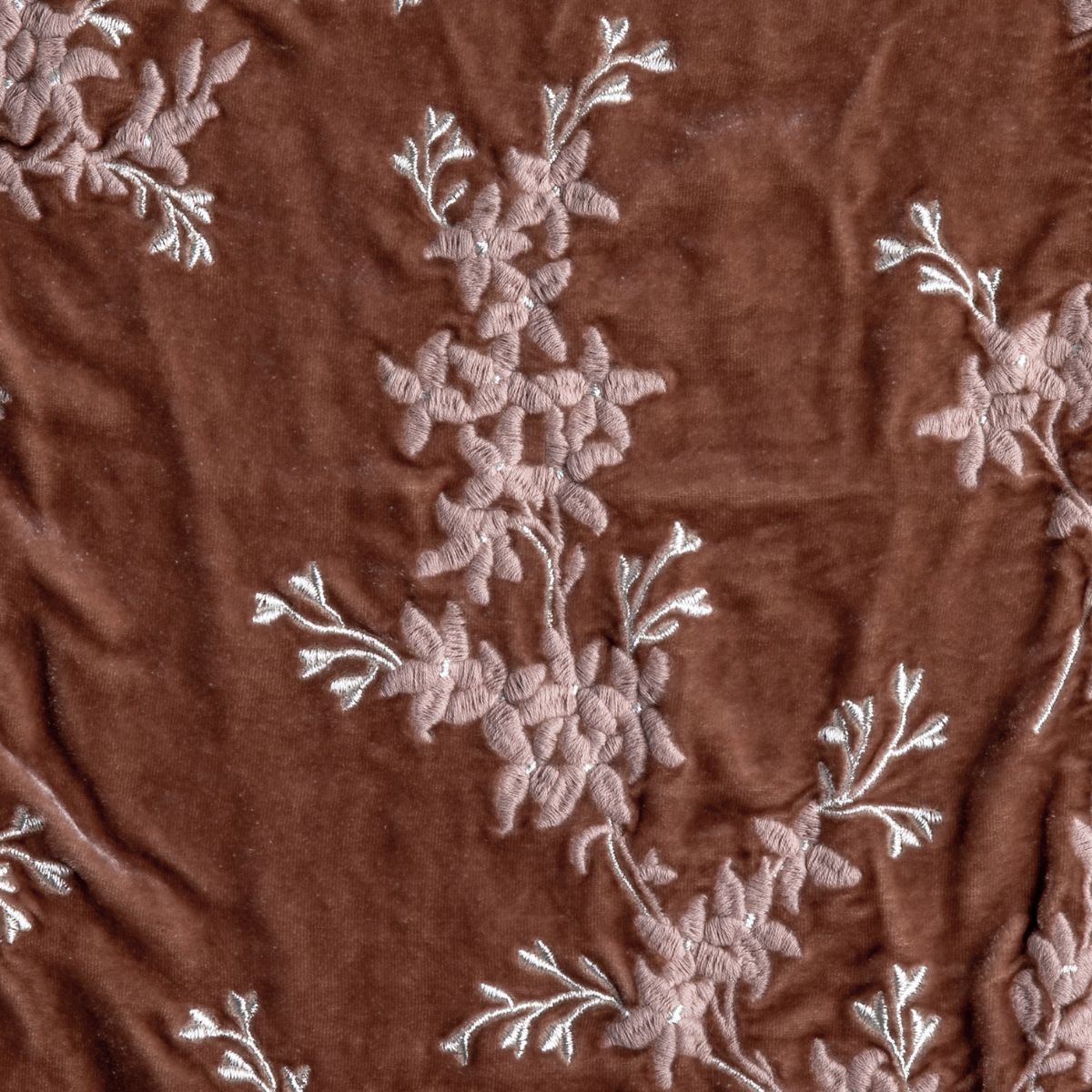 Rouge: A close up of embroidered silk velvet fabric in rouge, a mid-tone blush pink.