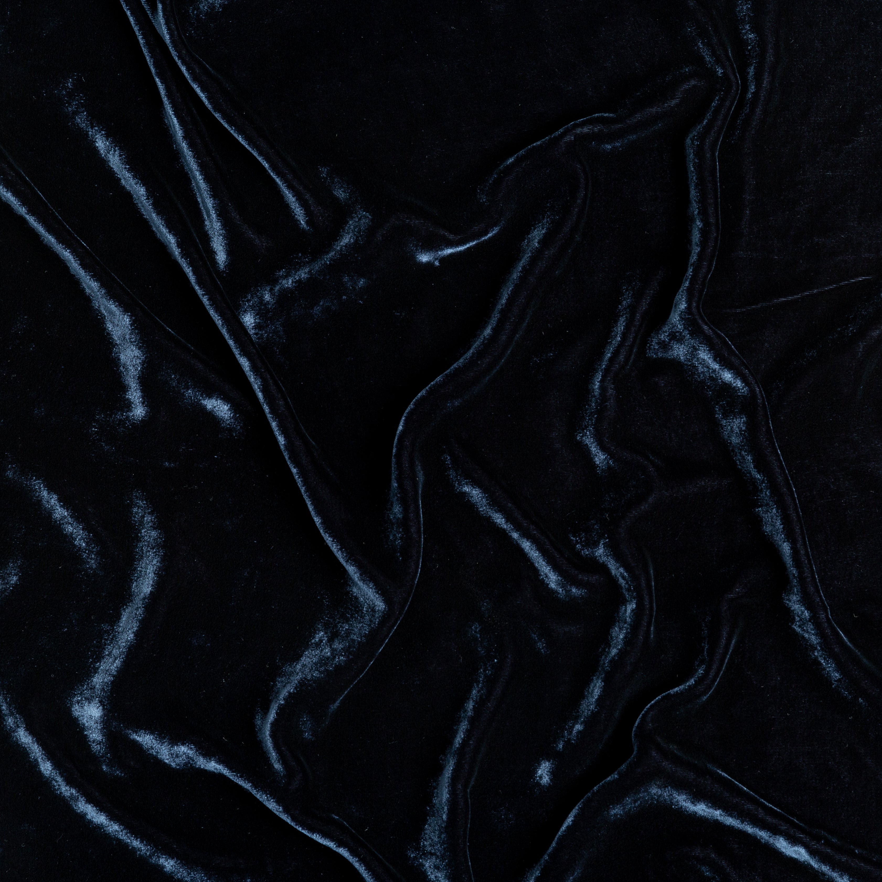 Midnight: A close up of silk velvet fabric in midnight, a rich indigo tone.