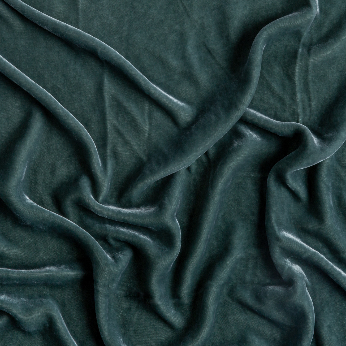 Eucalyptus: A close up of silk velvet fabric in eucalyptus, a soft light green.