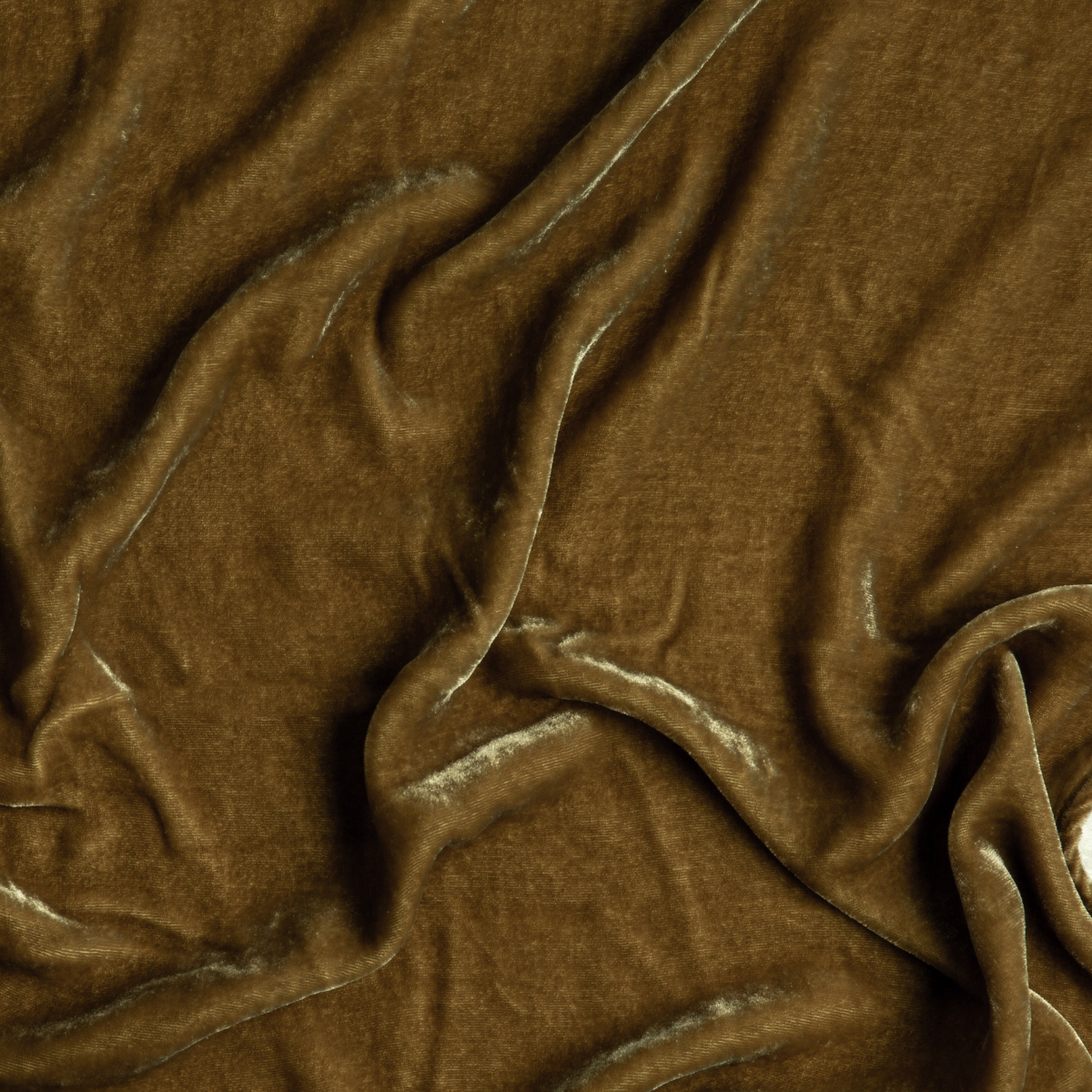 Honeycomb: A close up of silk velvet fabric in honeycomb, a warm golden tone.