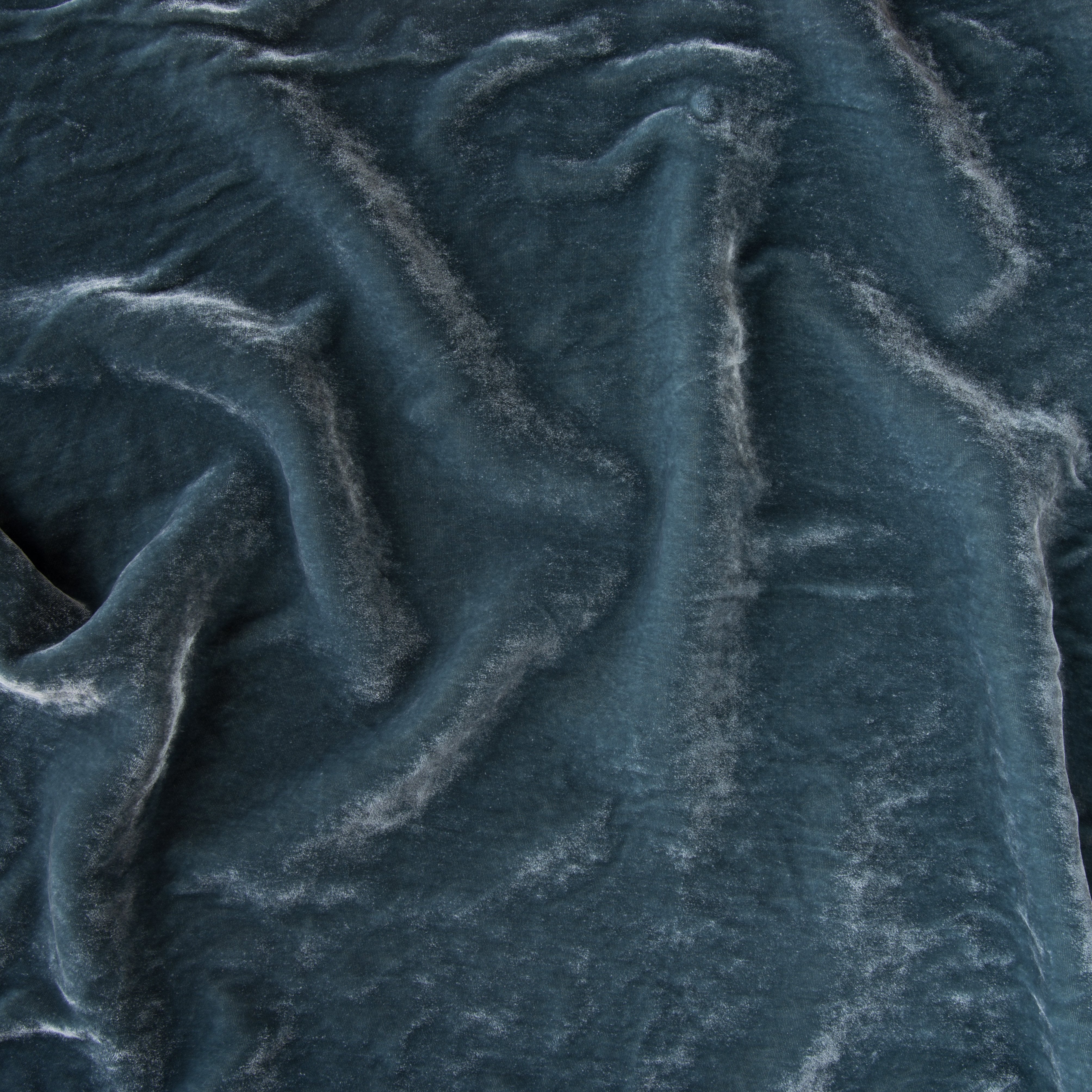 Mineral: A close up of silk velvet in mineral, a soothing seafoam blue with subtle grey-green undertones.