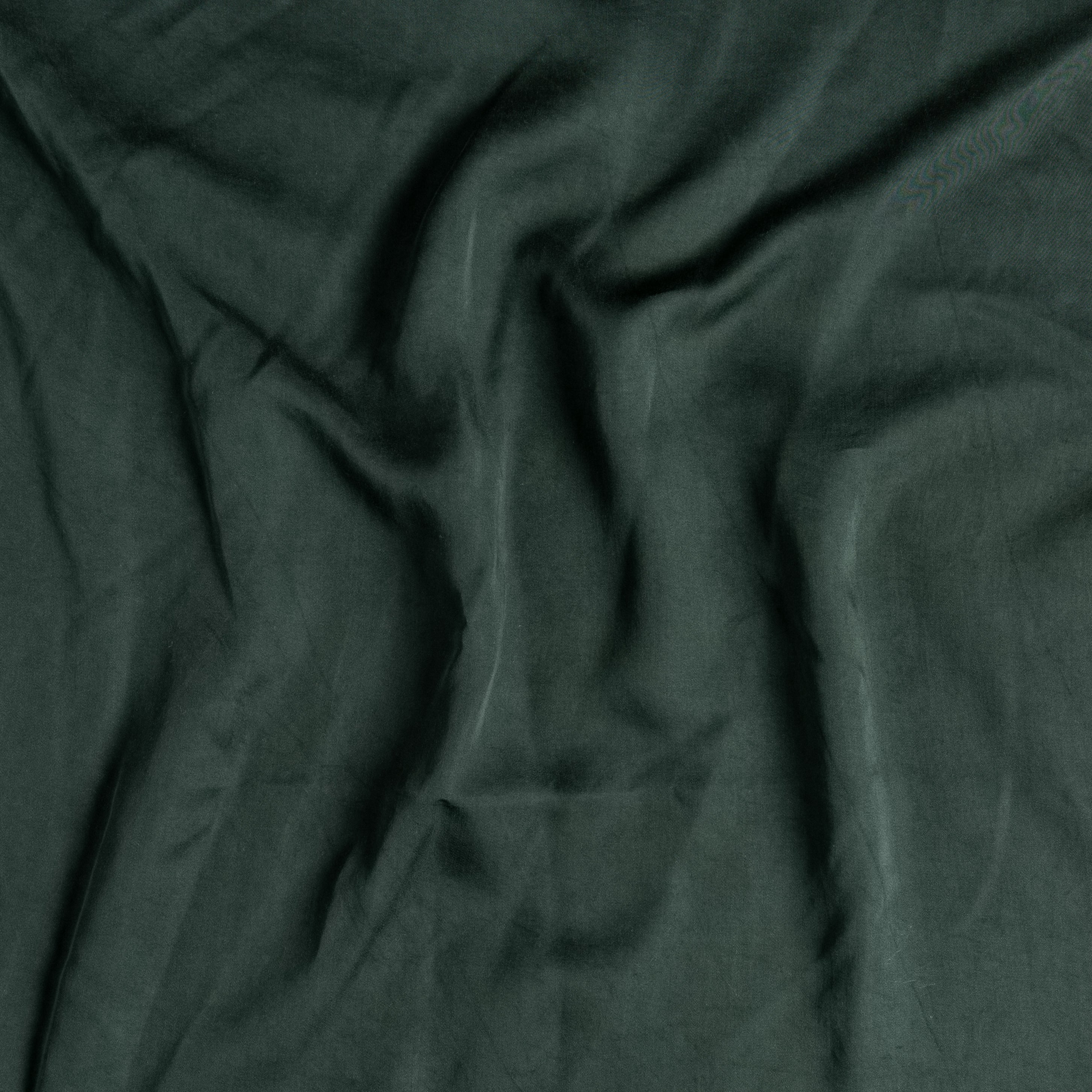 Juniper: tencel™ fabric in juniper, a deep green tone.