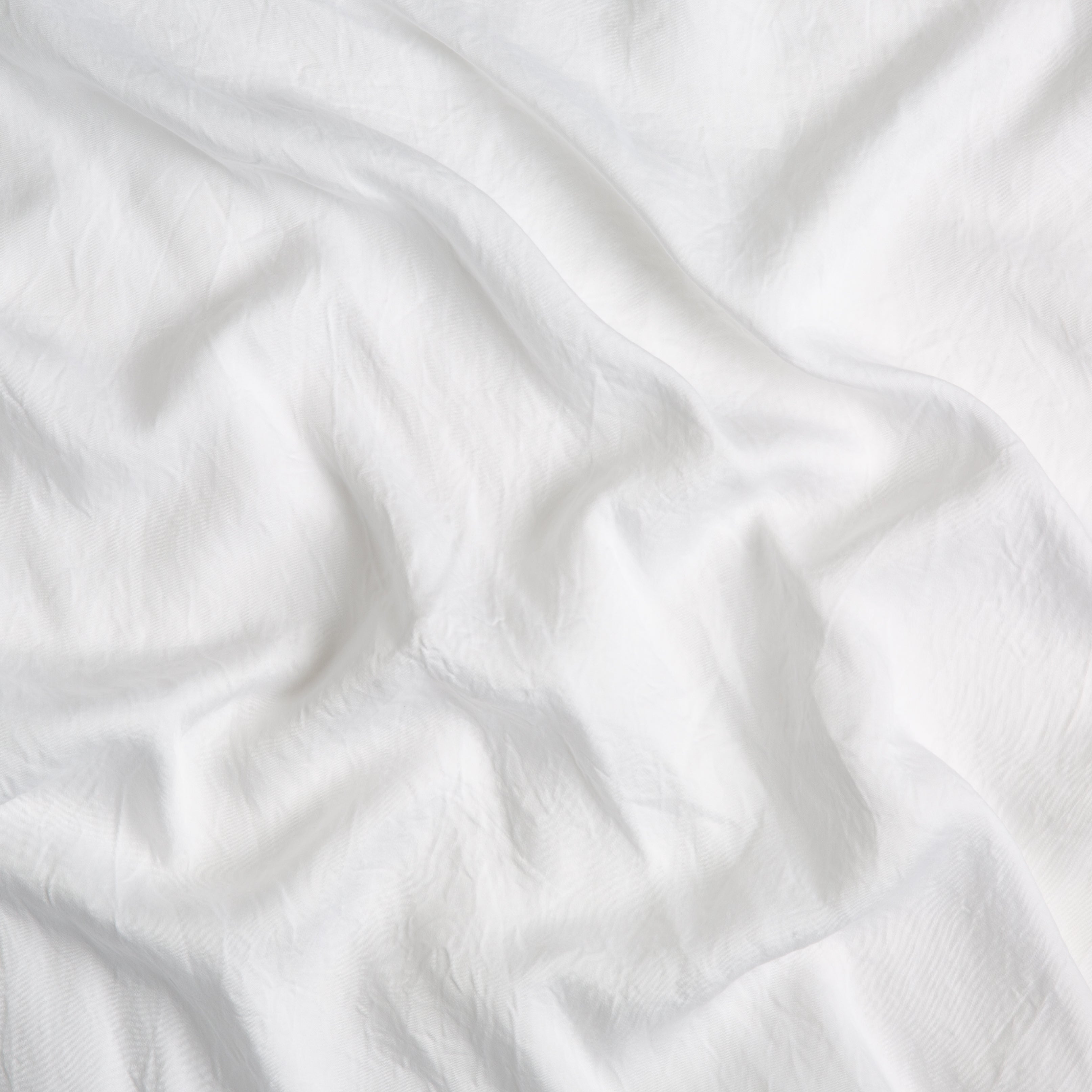White: A close up of Tencel™ fabric in classic white.