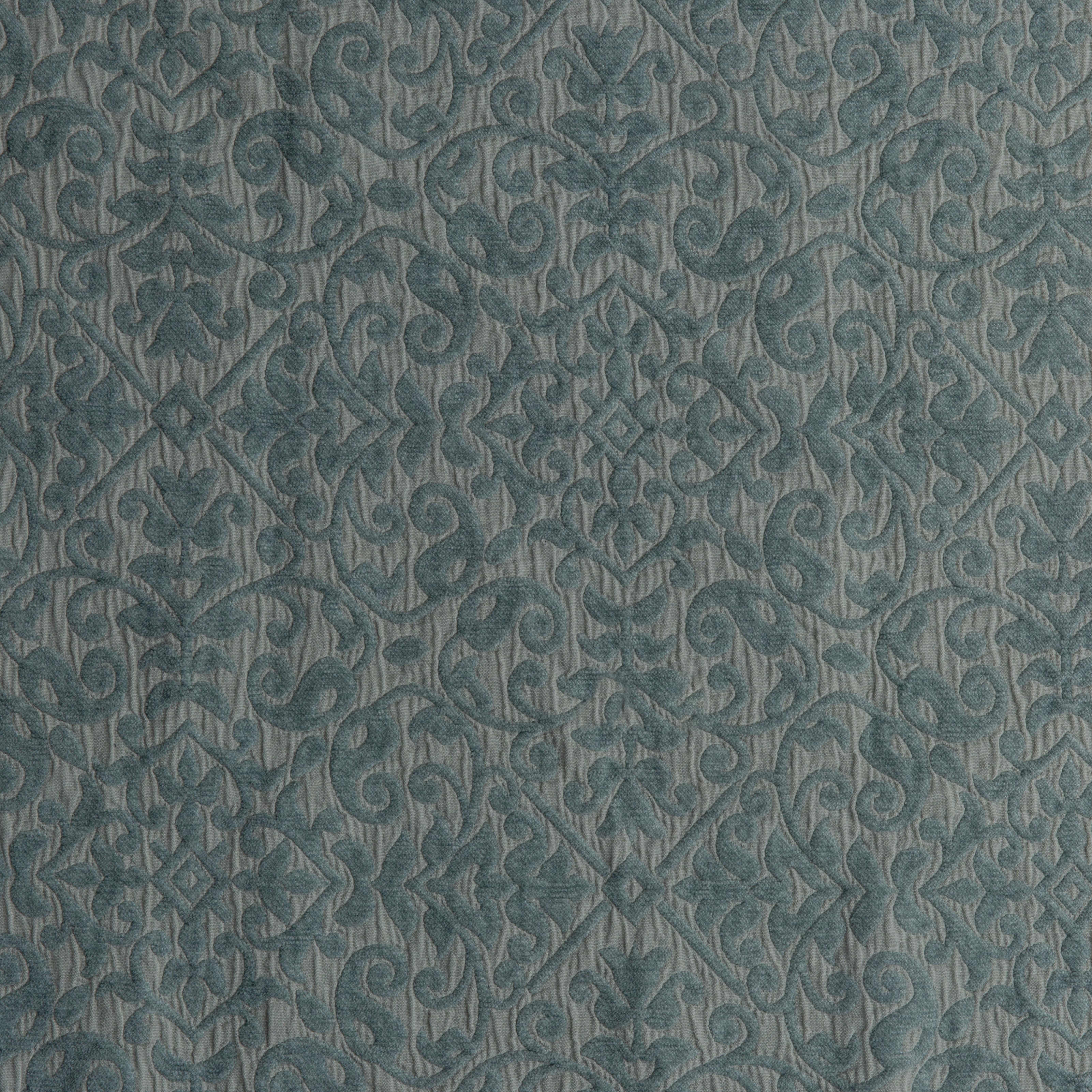 Eucalyptus: A close up of cotton chenille fabric in eucalyptus, a soft light green.