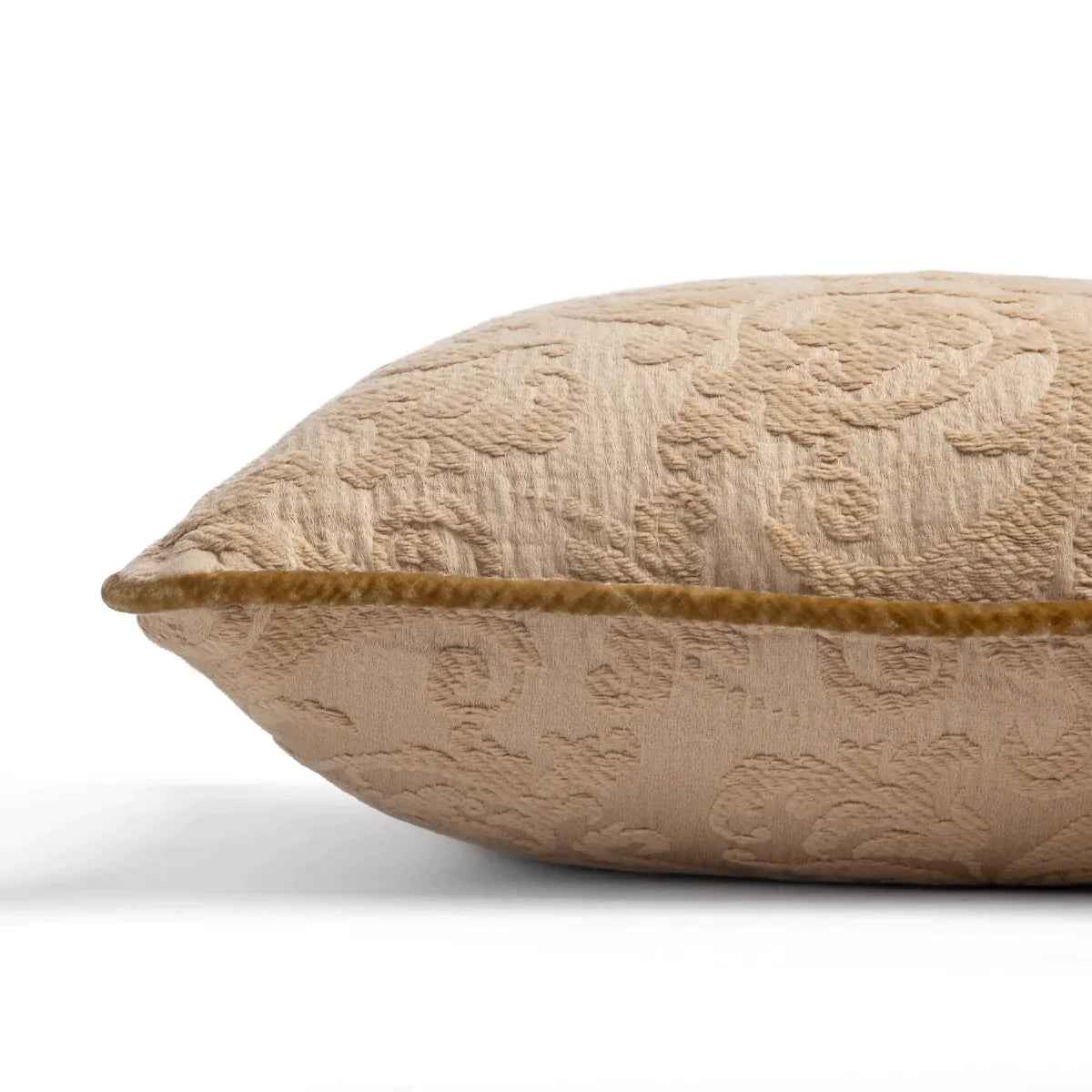 Honeycomb: Organic cotton damask square pillow with silk velvet trim on white background — side angle.
