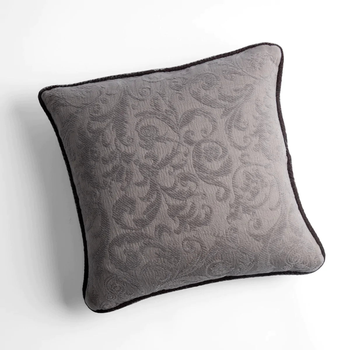 Moonlight: Organic cotton damask square pillow with silk velvet trim on white background — overhead angle.