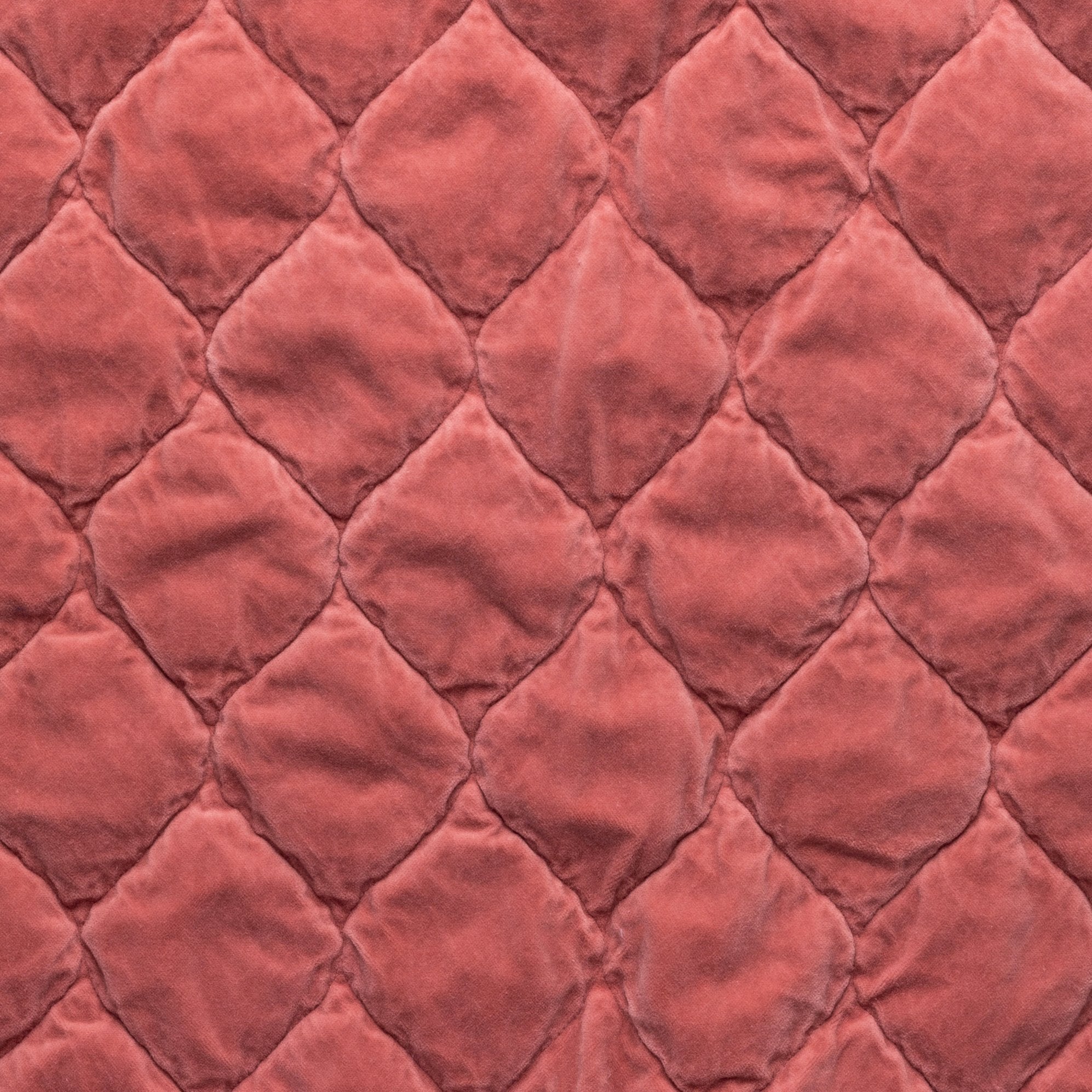 Poppy: Close-up of Harlow cotton velvet quilting in poppy, a warm coral pink.