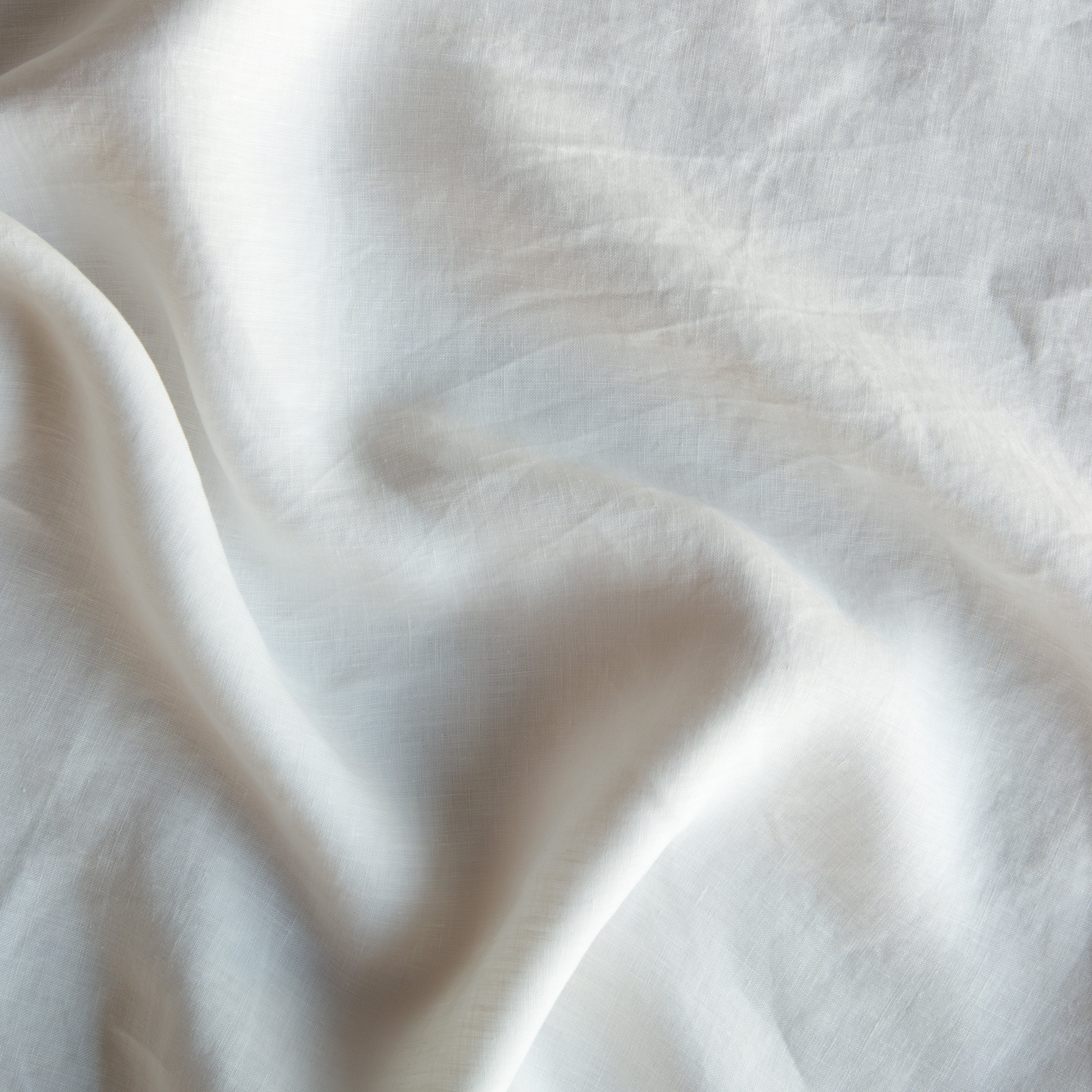 Winter White: A close up of linen winter white, softer and warmer in tone than classic white.