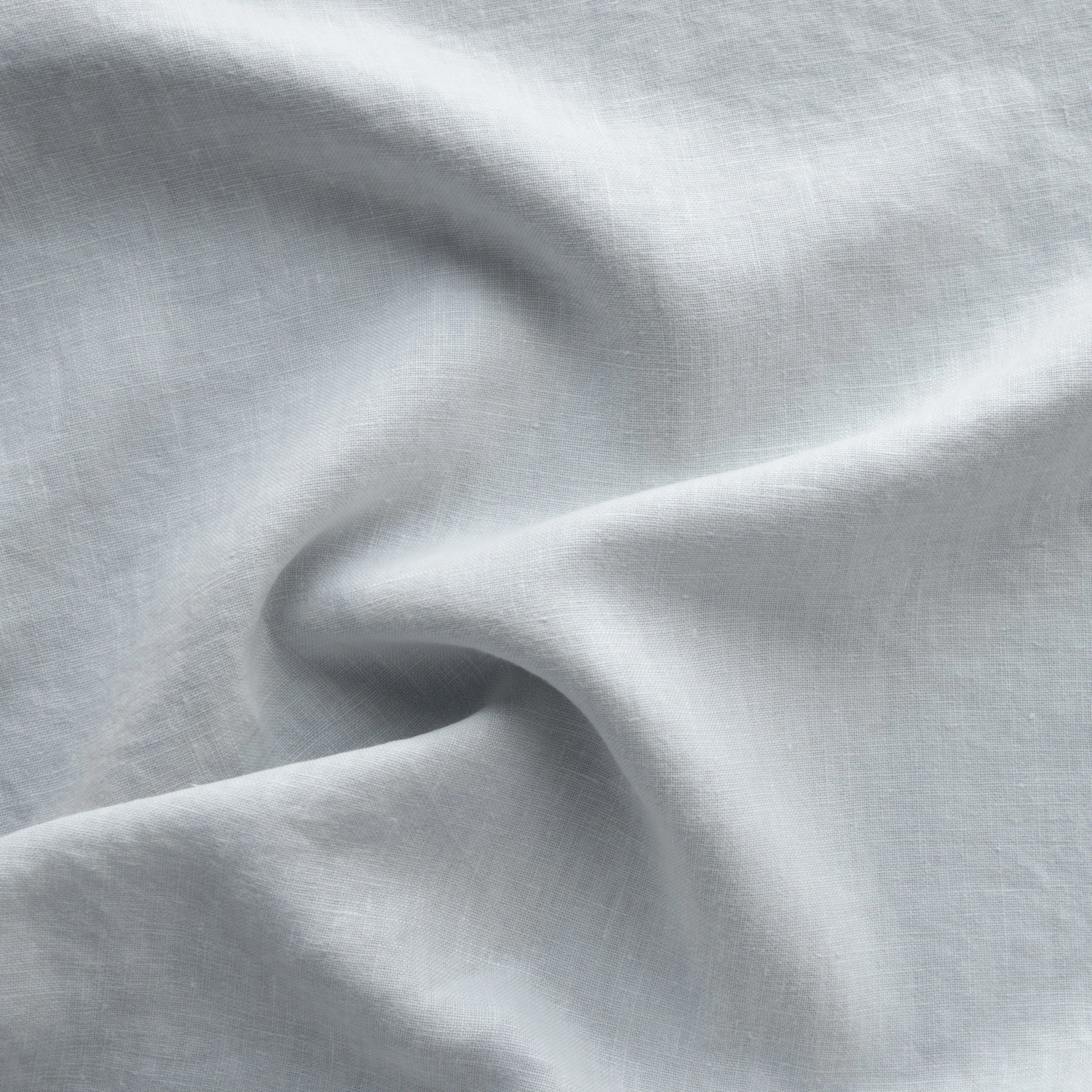 Cloud: A close up of midweight linen in cloud, a soft, subtle sky blue-grey.