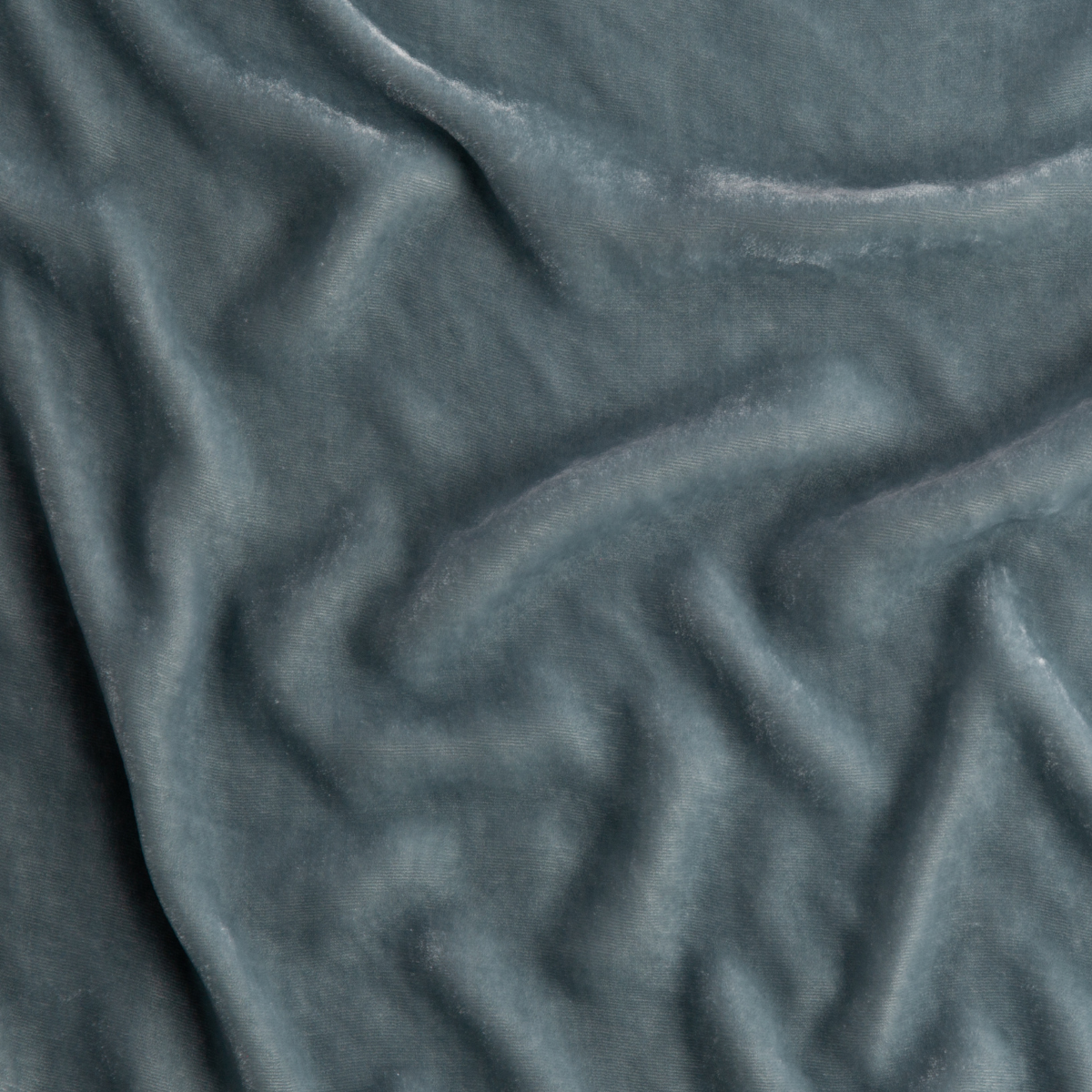 Cloud: A close up of silk velvet in cloud, a soft, saturated sky blue-grey.