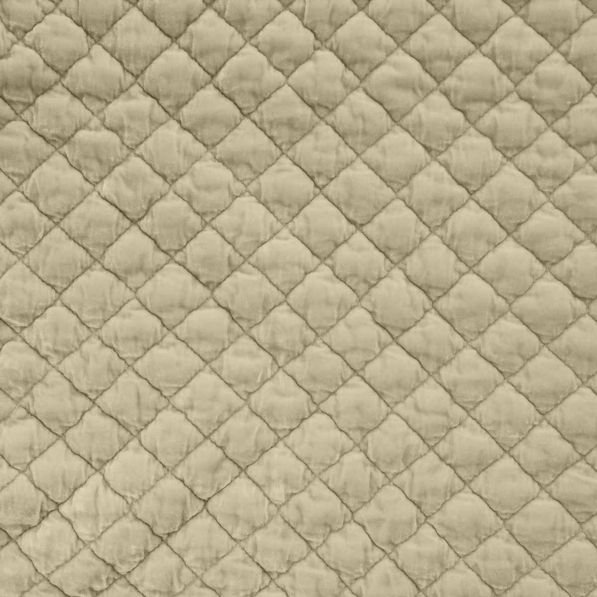 Parchment: Close-up of quilted silk velvet in parchment, a warm, antiqued cream.