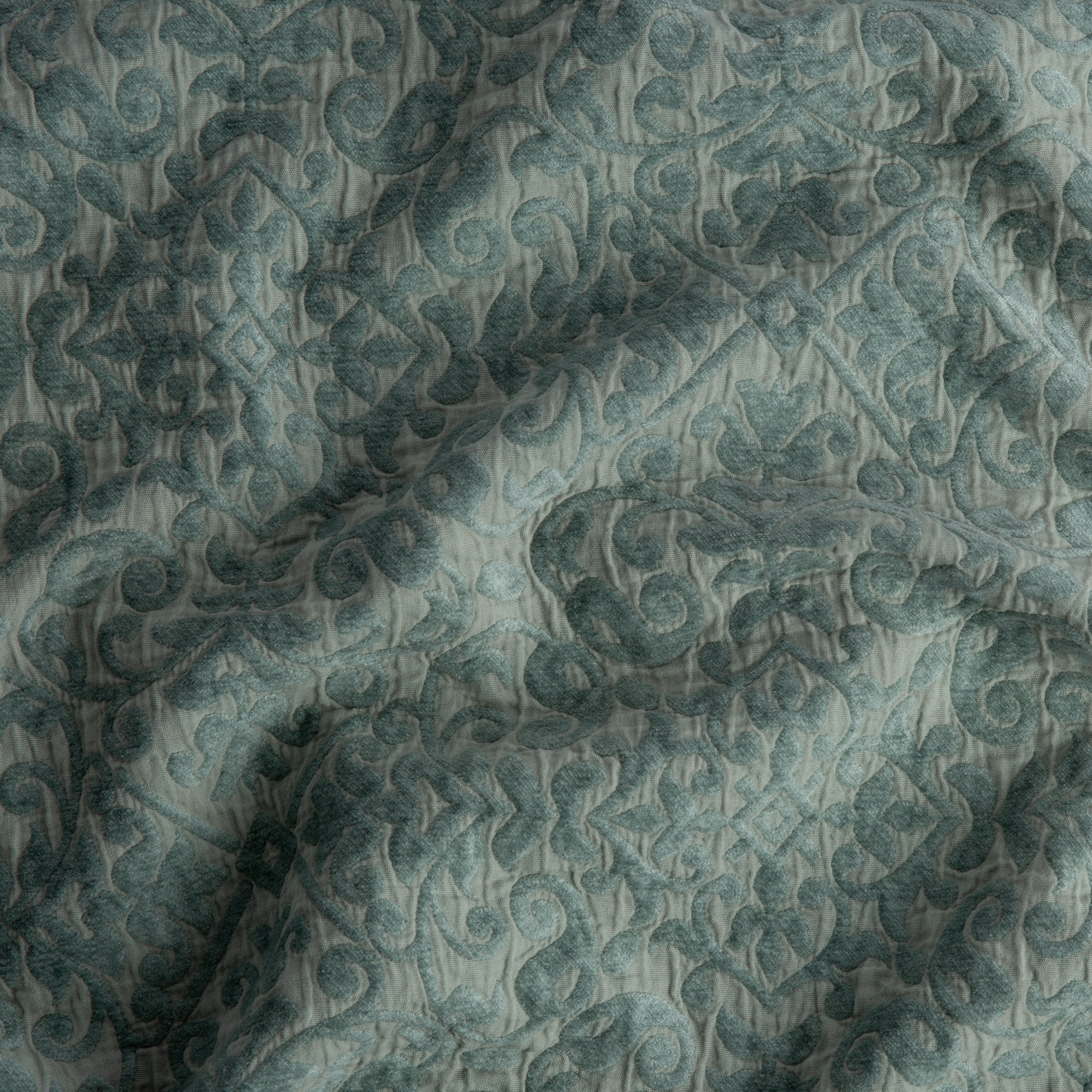 Eucalyptus: A close up of Vienna cotton chenille jacquard in eucalyptus, a soft light green.