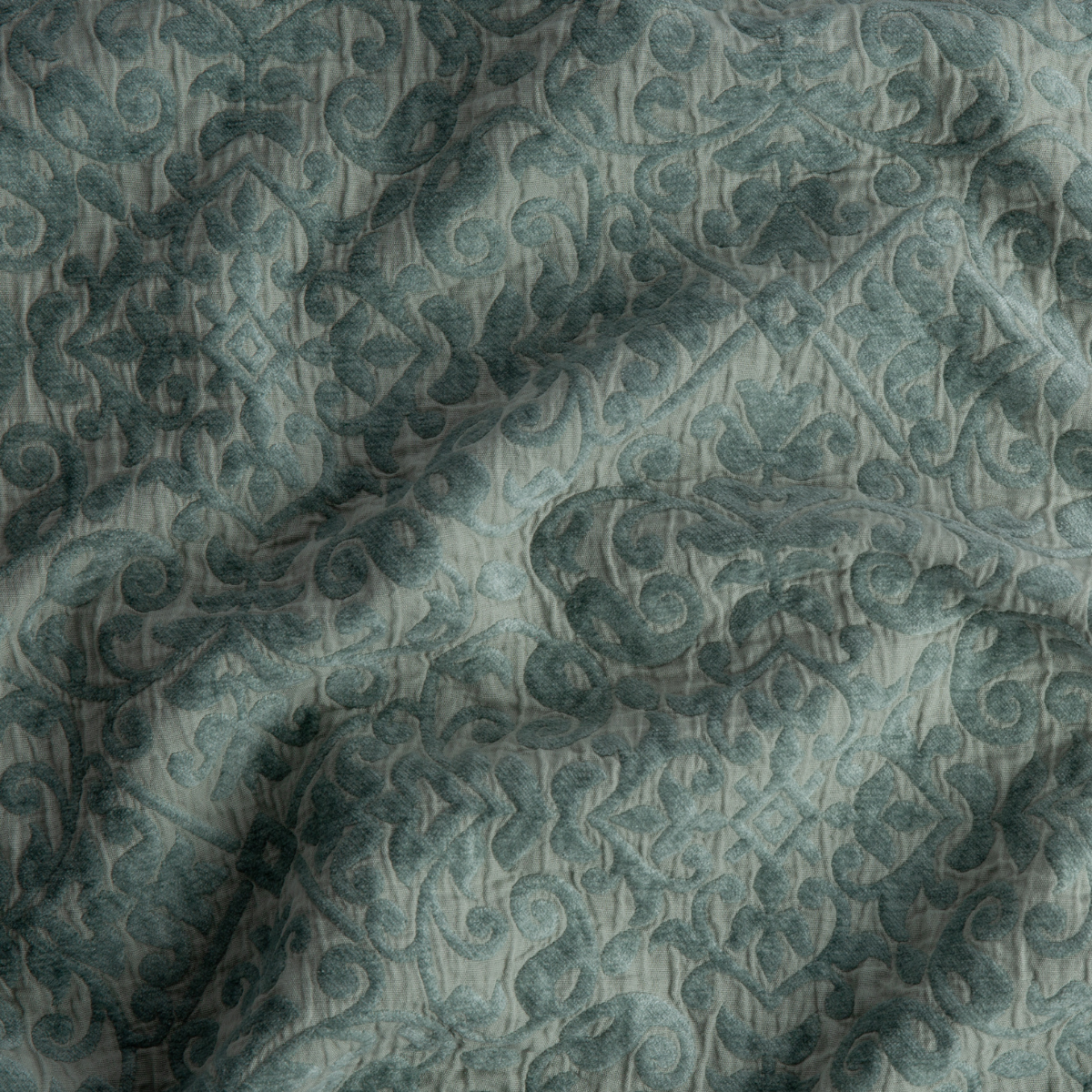 Eucalyptus: A close up of Vienna cotton chenille jacquard in eucalyptus, a soft light green.