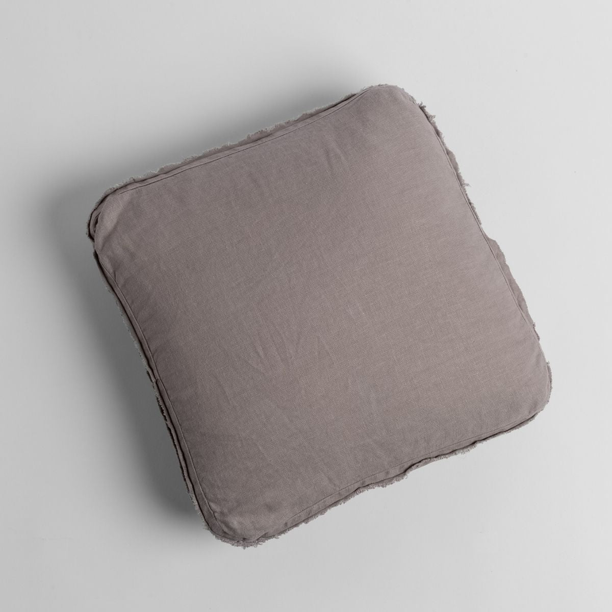 Fog: midweight linen 18x18 inch throw pillow shot from overhead against a white background. 