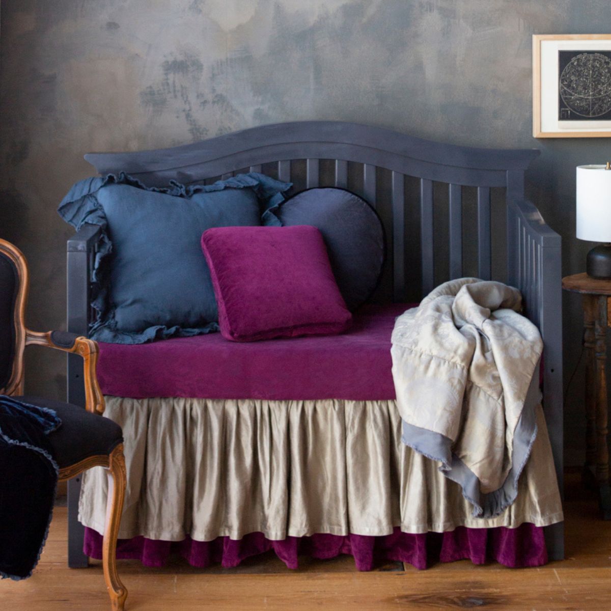 [allvariants]: a moody crib scene with jewel toned crib bedding and touches of greys. 