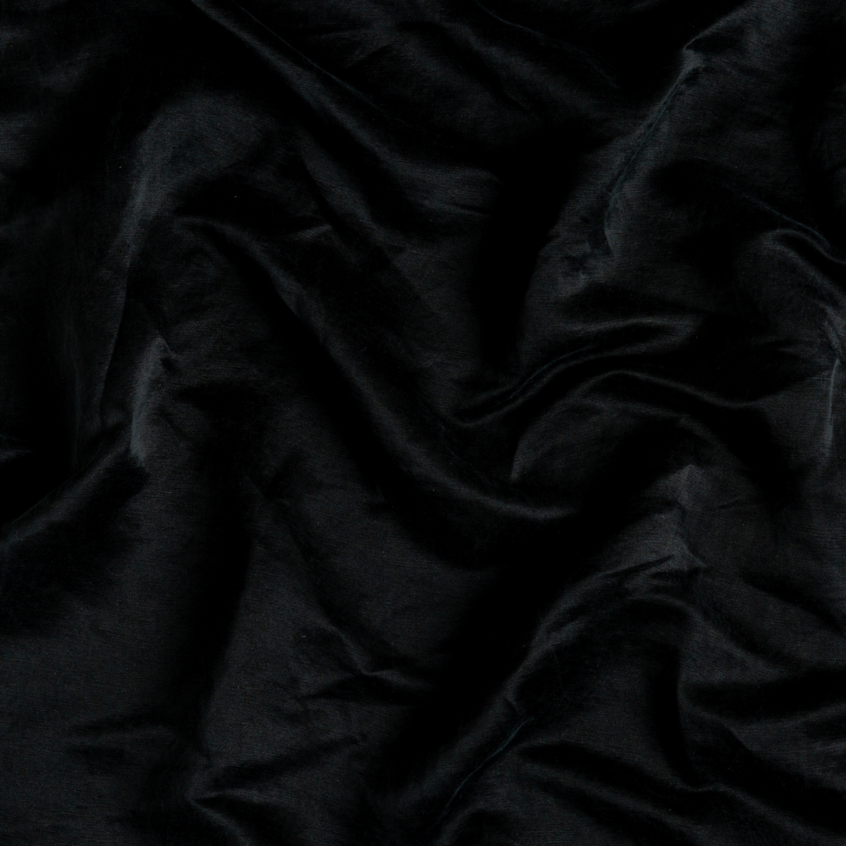 Corvino: A close up of charmeuse fabric in Corvino, a black tone.