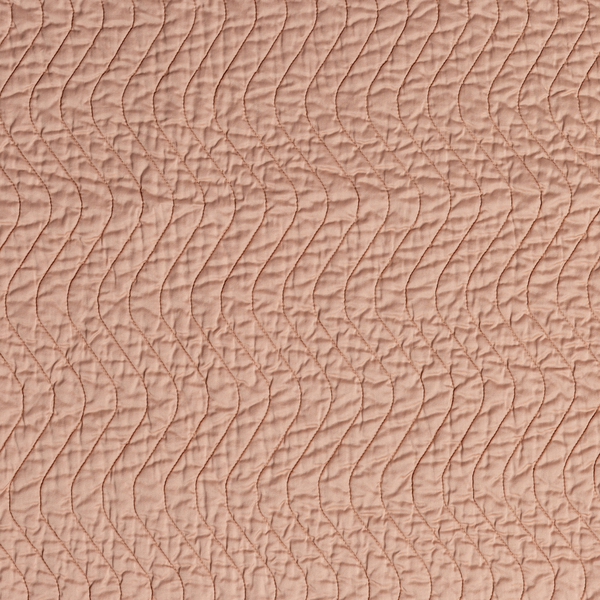 Rouge: A close up of quilted cotton sateen fabric in rouge, a mid-tone blush pink.