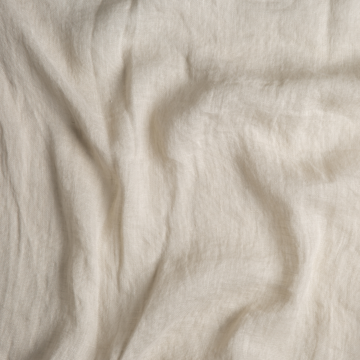 Parchment: A close up of linen whisper fabric in parchment, a warm, antiqued cream.