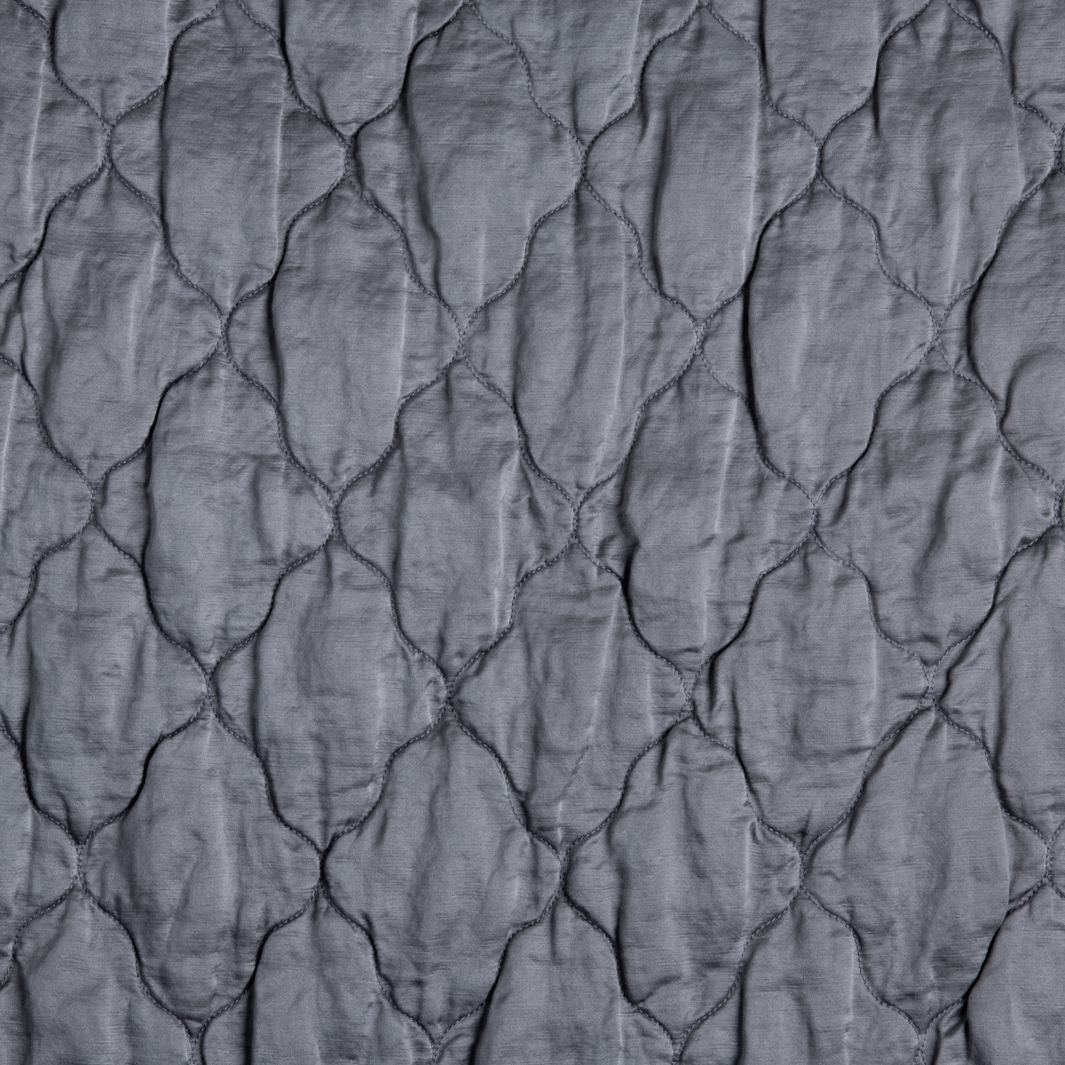 French Lavender: a close up of quilted charmeuse fabric in french lavender, a neutral violet tone.