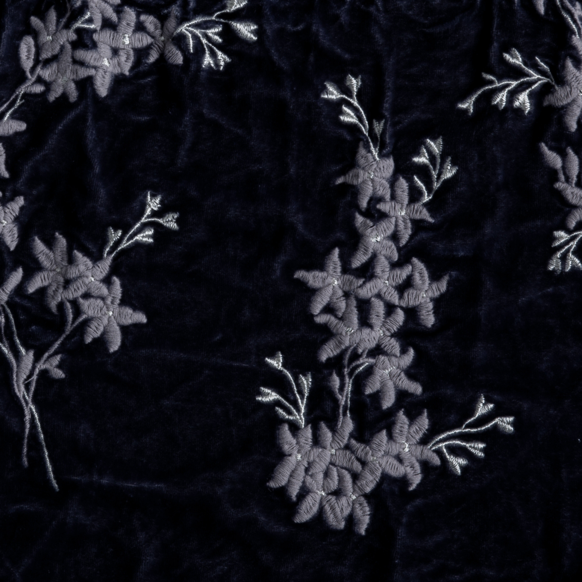 French Lavender: a close up of embroidered silk velvet fabric in french lavender, a neutral violet tone.