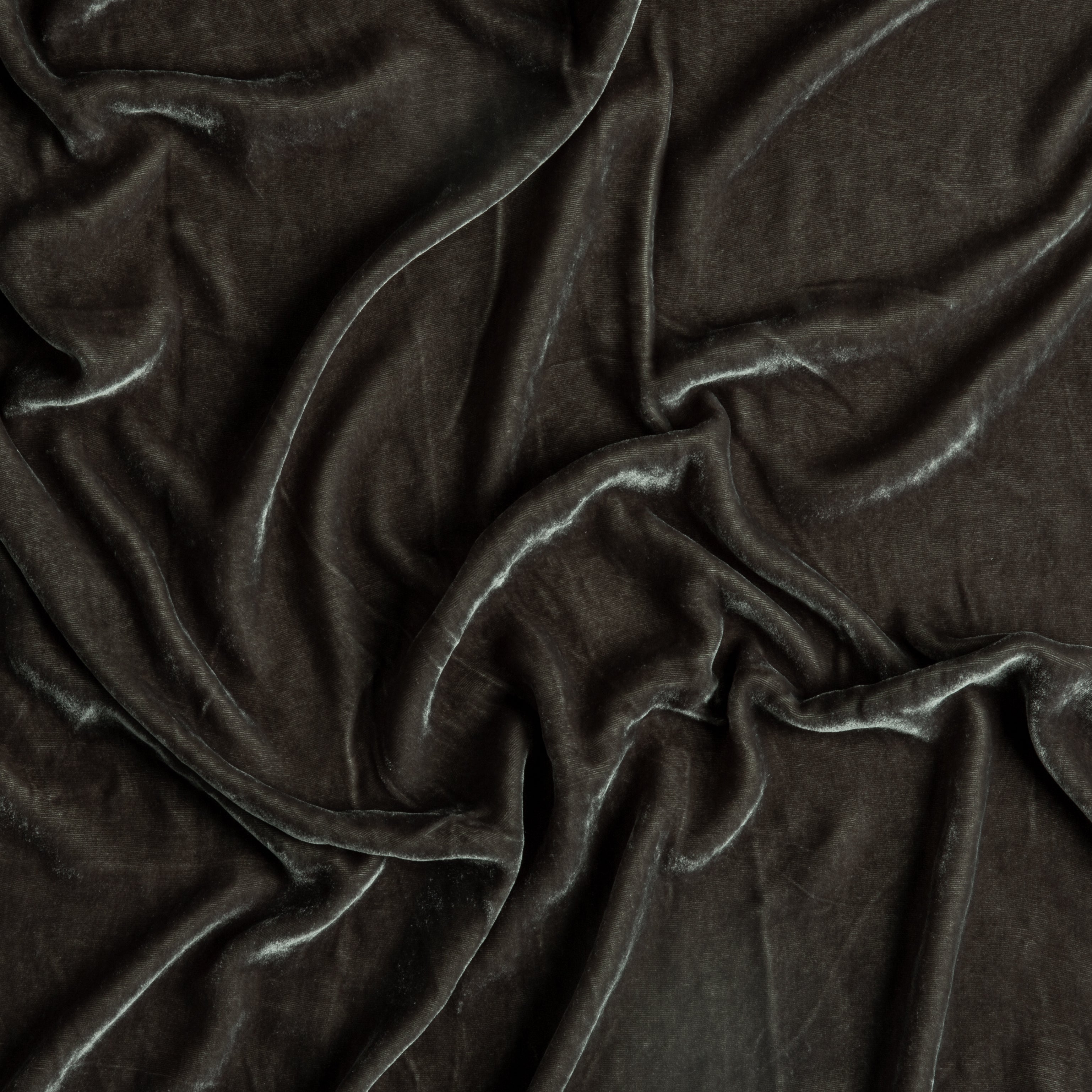 Moonlight: A close up of silk velvet fabric in moonlight, a saturated, cool, mid-dark grey tone.