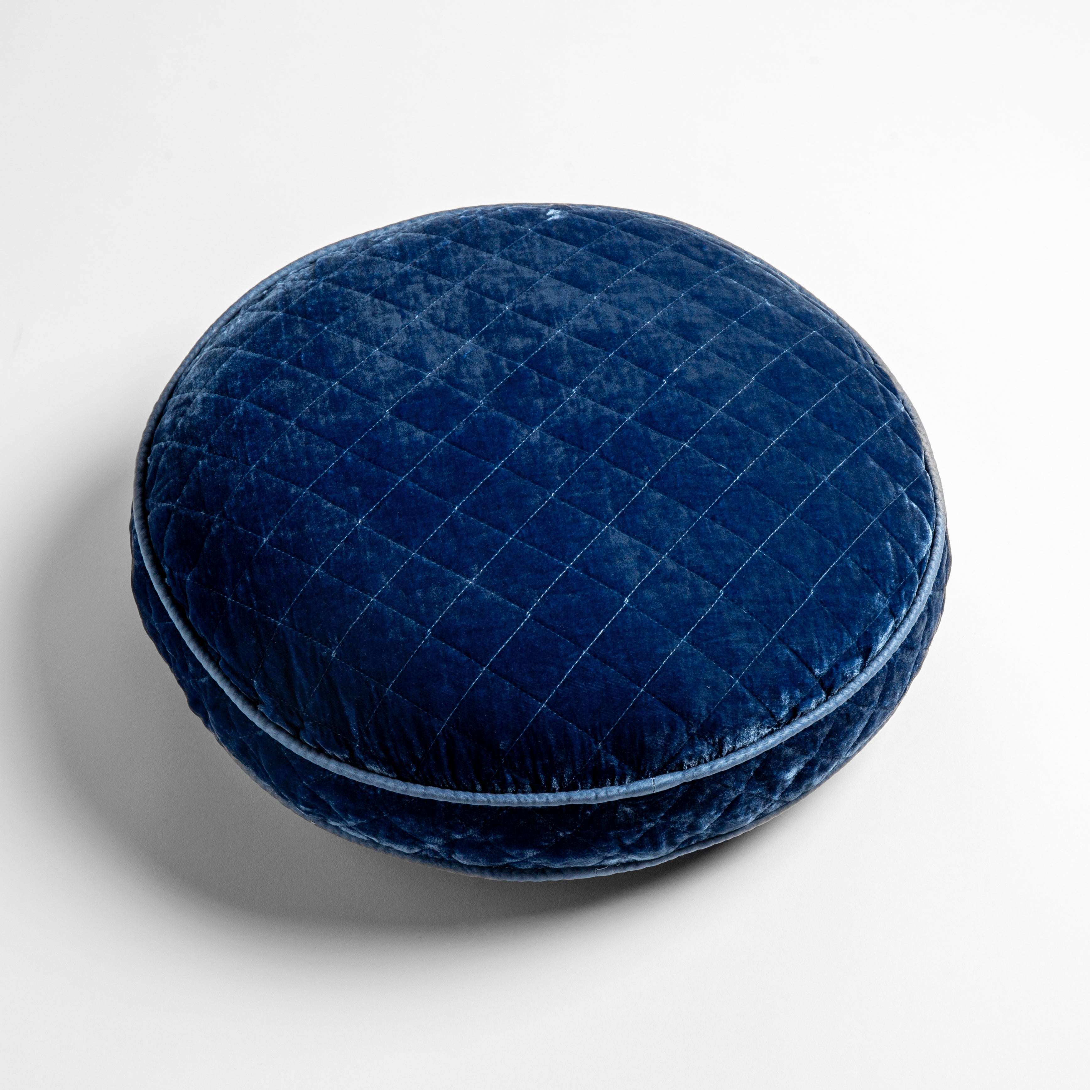 Tahoe Blue: overhead at a slight angle against a white background, the face and gusset of the pillow are visible.