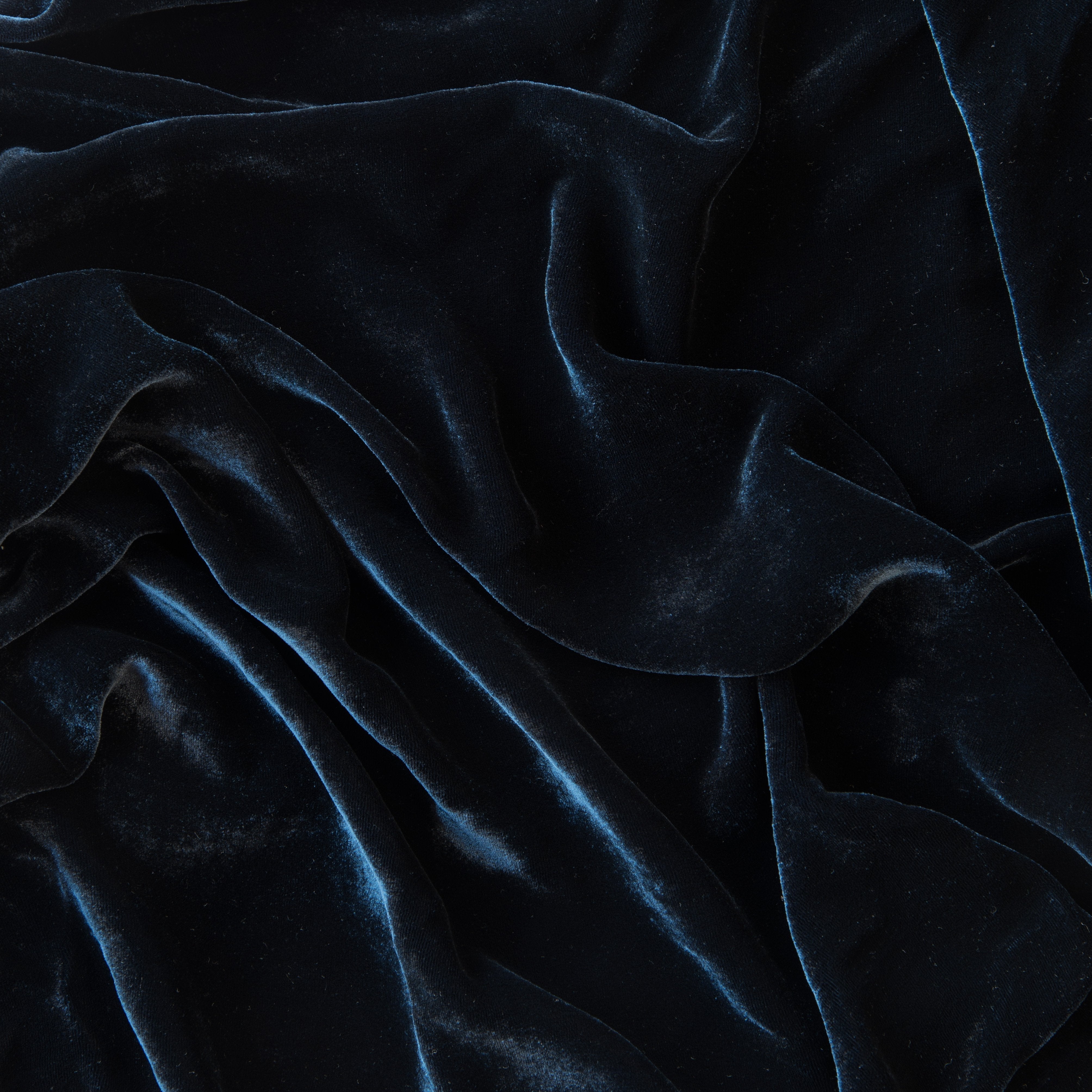Midnight: A close up of silk velvet in midnight, a rich indigo tone. 