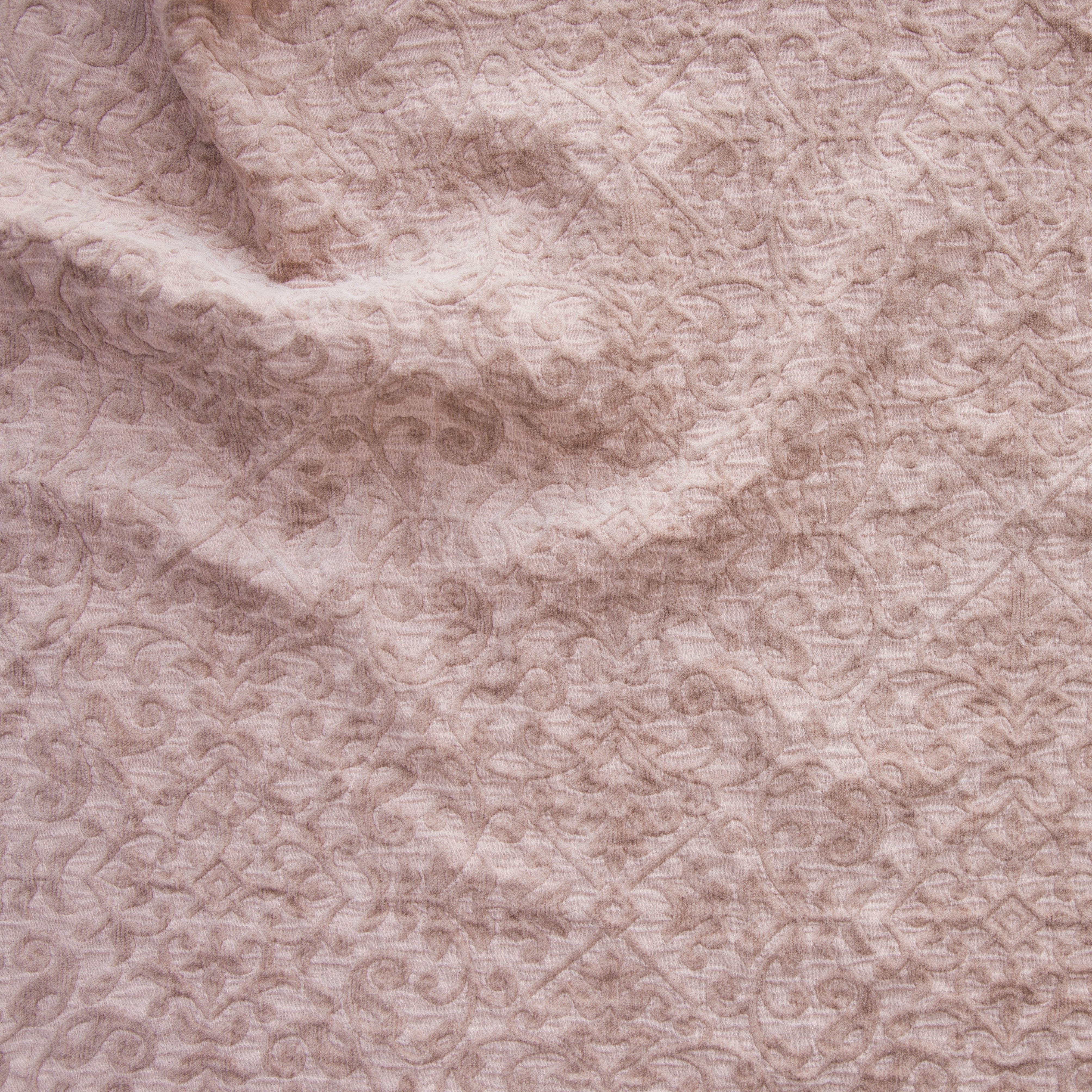 Rouge: A close up of Vienna cotton chenille jacquard in rouge, a mid-tone blush pink. 