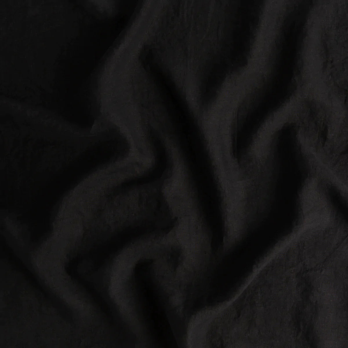 Corvino: A close up of linen  fabric in Corvino, a black tone