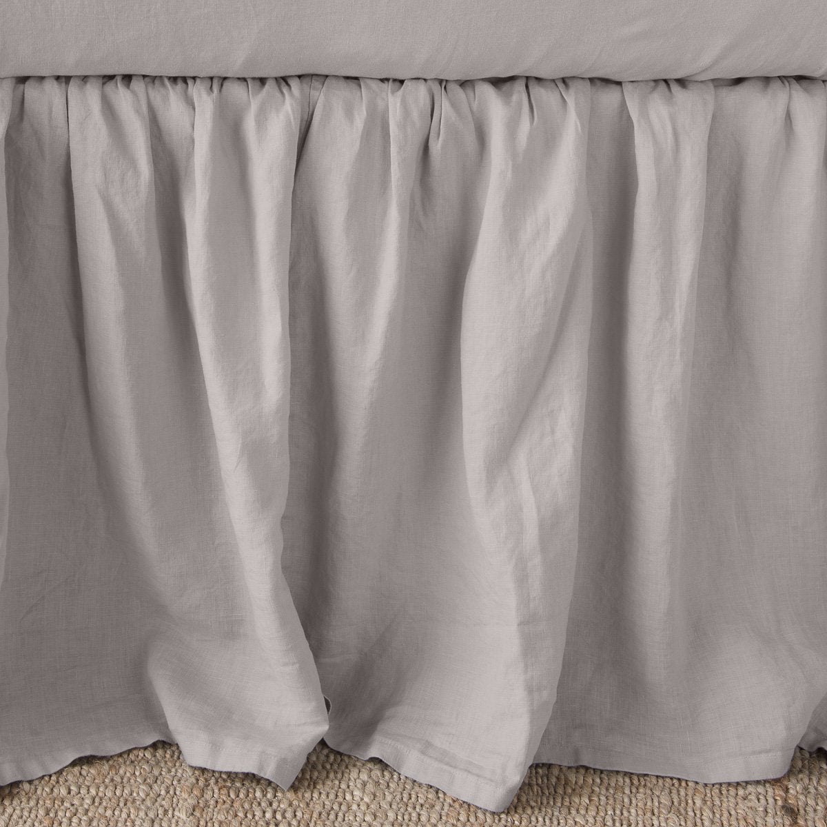 Fog: Close-up of bed skirt, featuring its softly gathered design.
