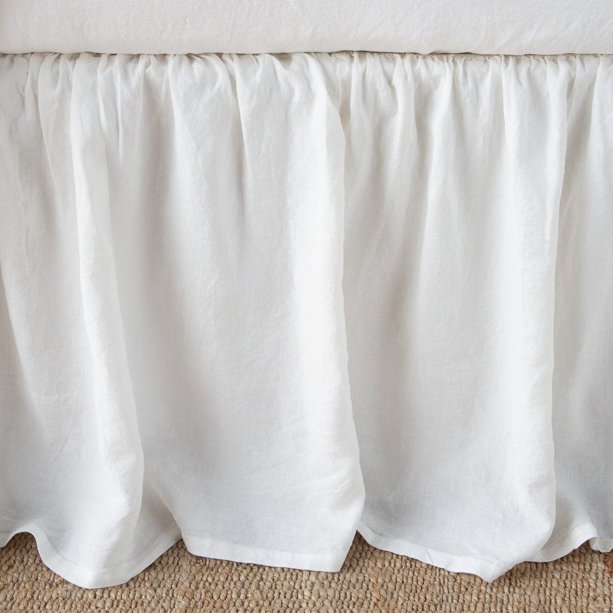 Winter White: Close-up of bed skirt, featuring its softly gathered design.