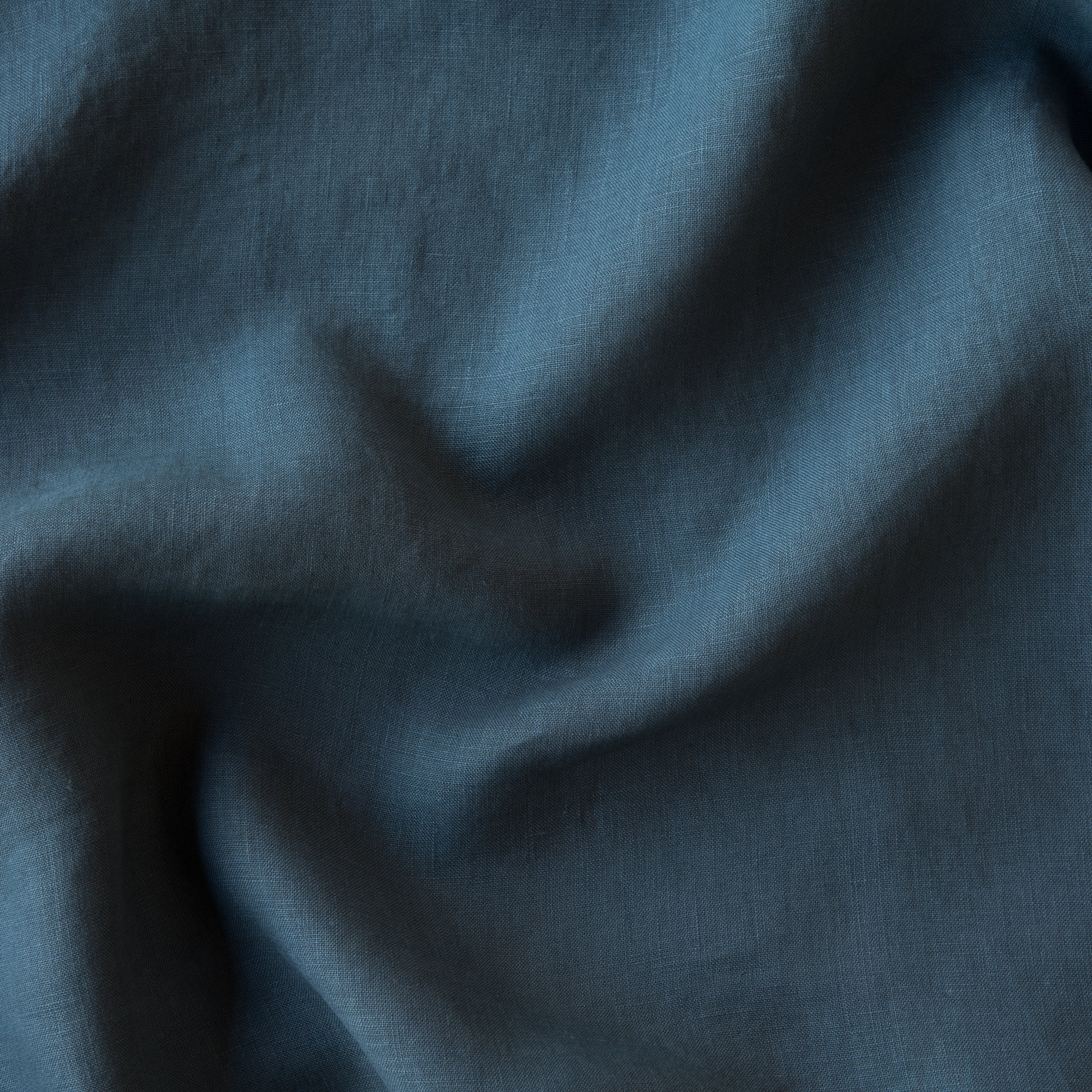 Midnight: A close up of linen in midnight, a rich indigo tone. 