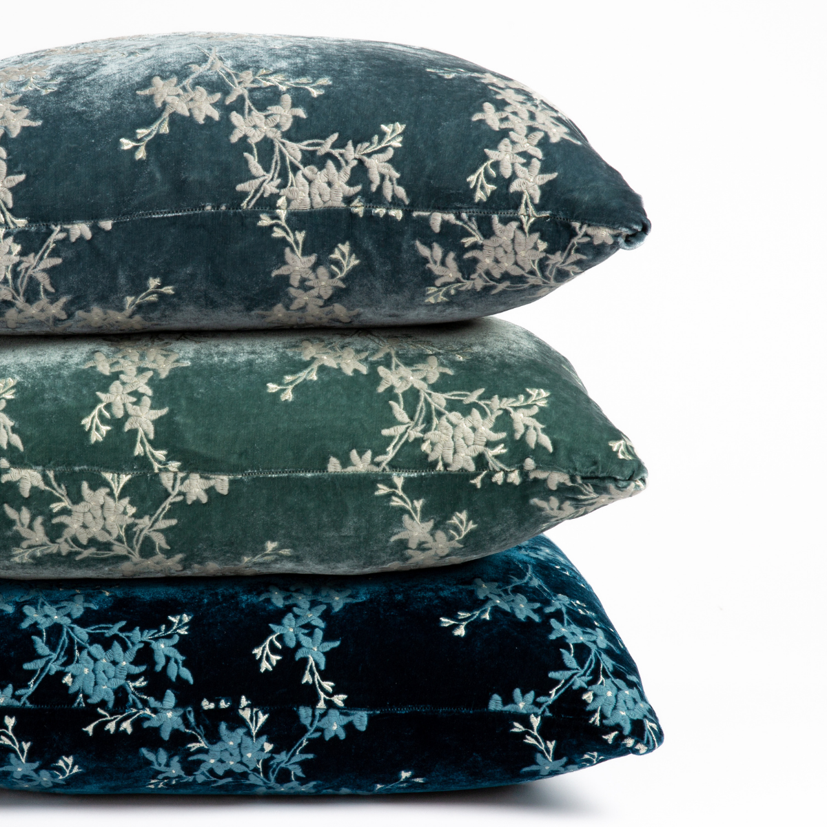 [allvariants}: three embroidered silk velvet 18x18 pillows stacked to show front and back of pillows, straight on against a white background.
