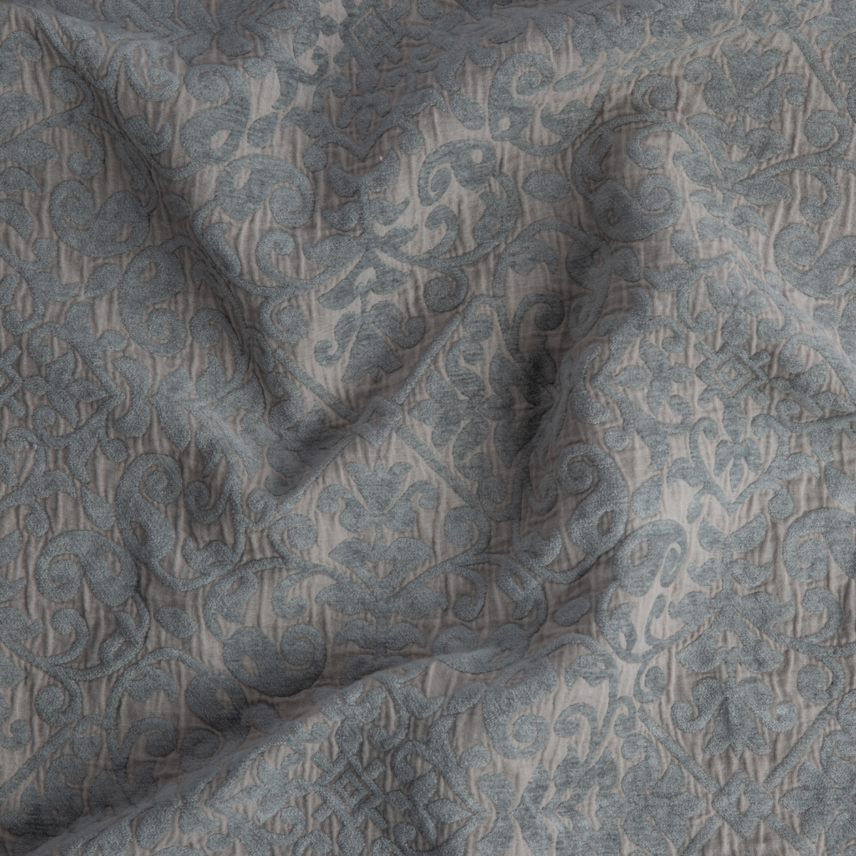 Fog: A close up of Vienna cotton chenille jacquard in fog, a neutral-warm, soft mid-tone grey. 